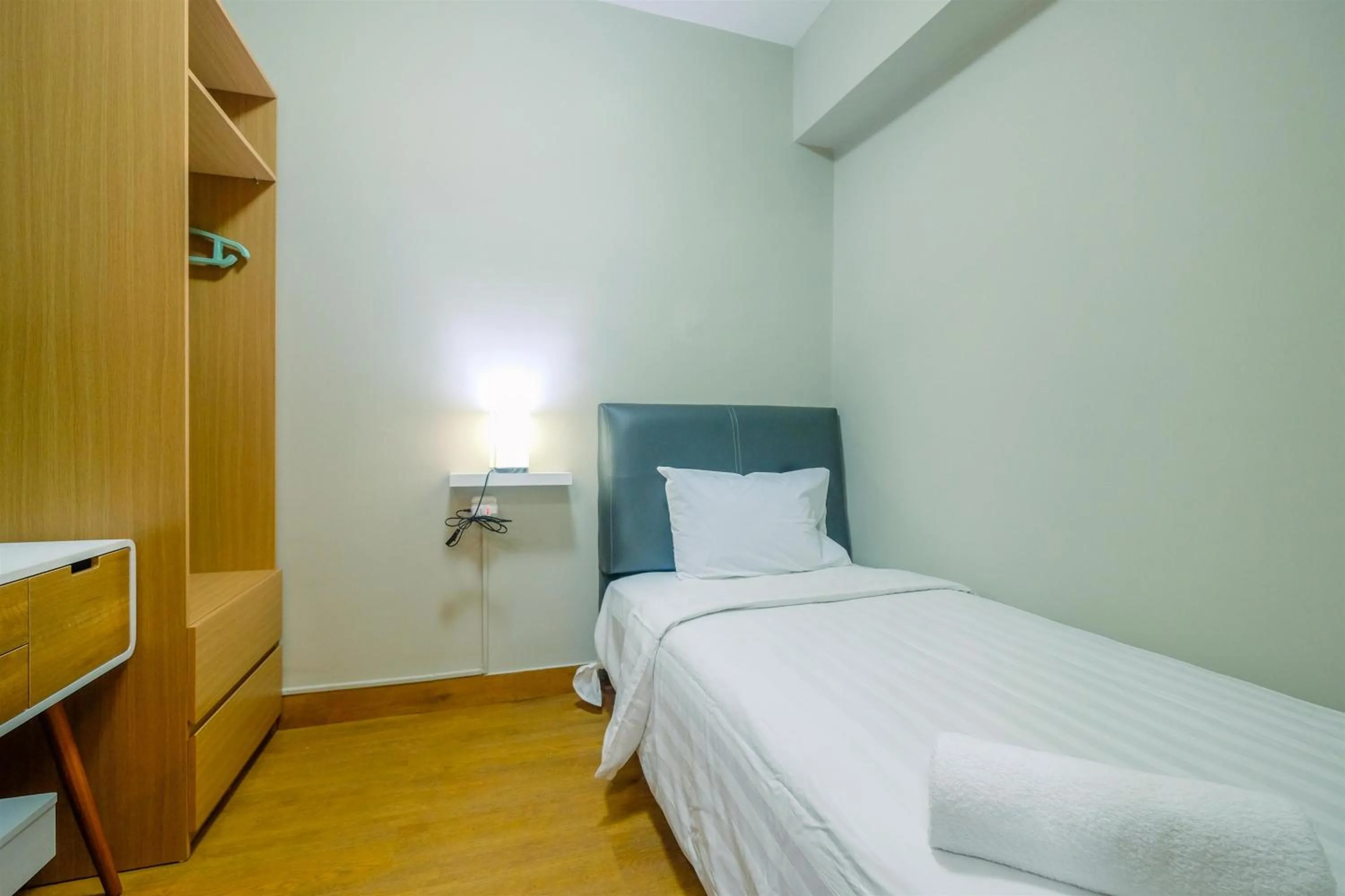 Bedroom in Comfortable 2BR Apartment at Cinere Resort By Travelio