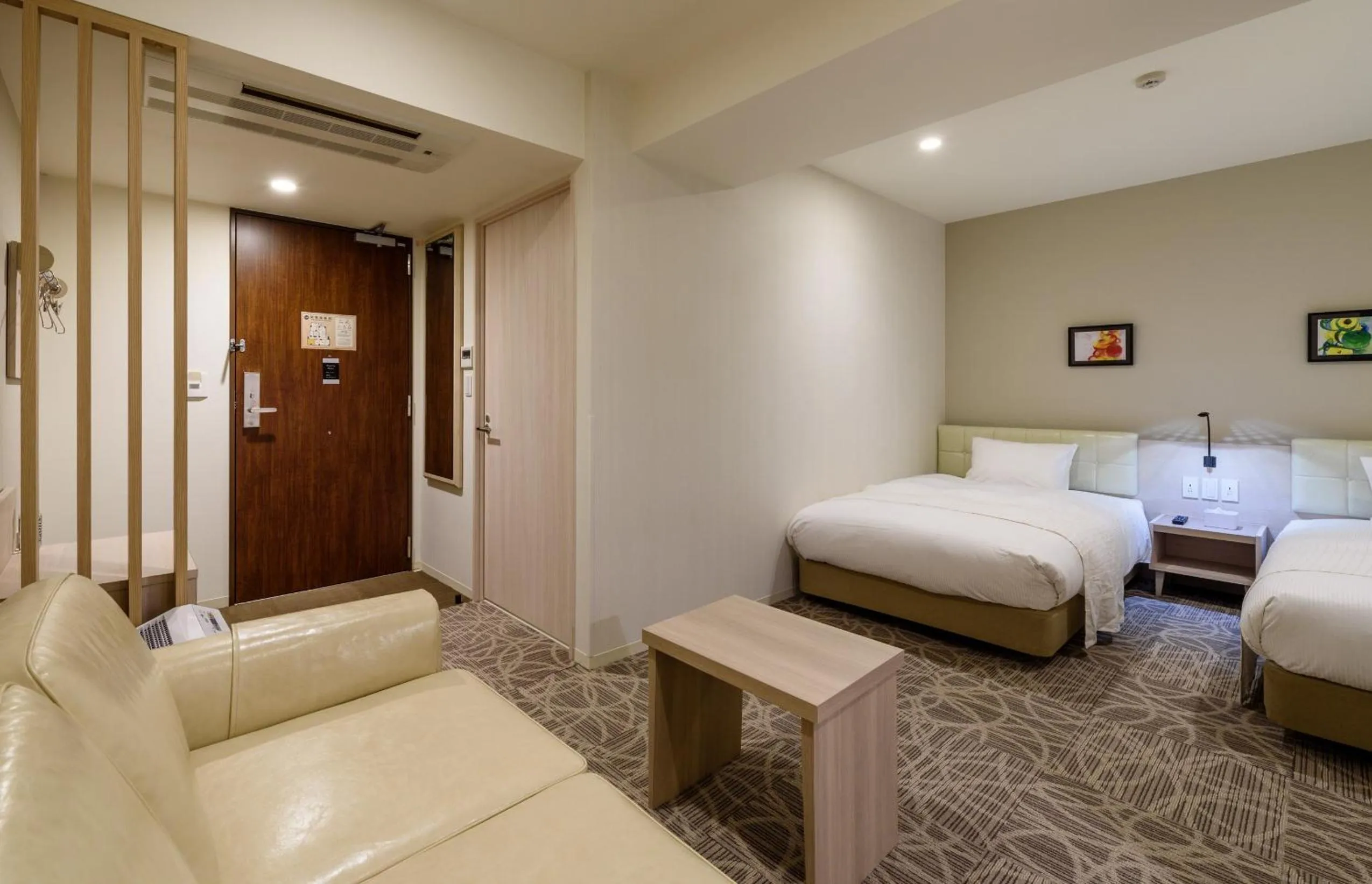 Bed in QuintessaHotel TokyoHaneda Comic&Books