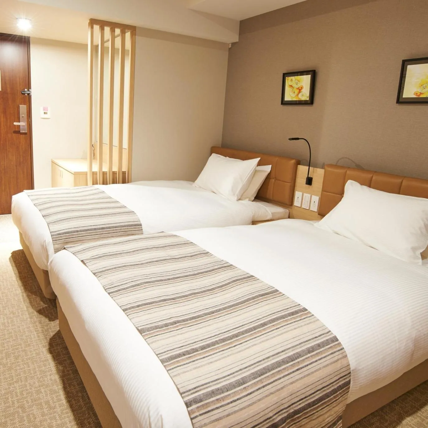 Bed in QuintessaHotel TokyoHaneda Comic&Books