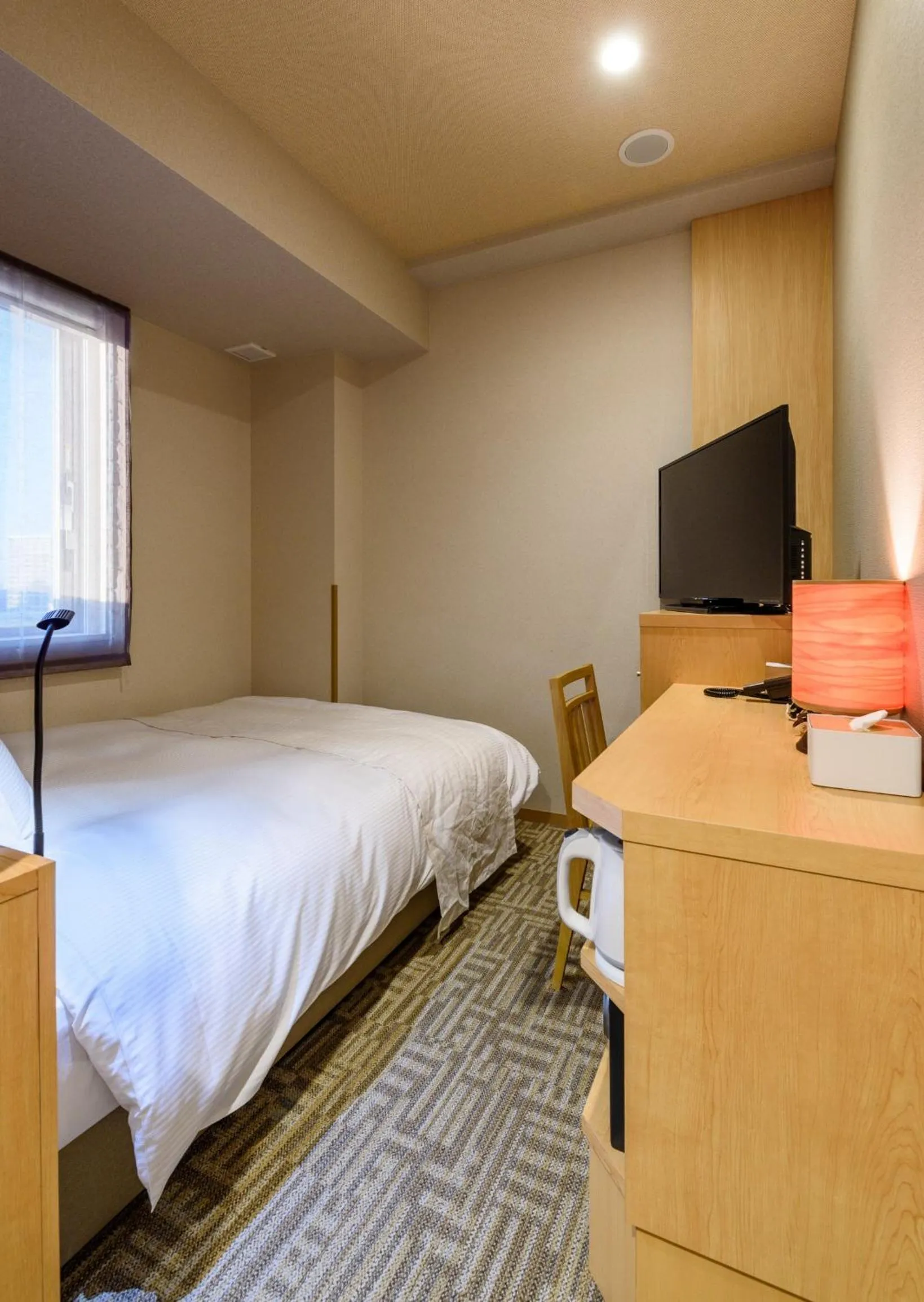 Bed in QuintessaHotel TokyoHaneda Comic&Books