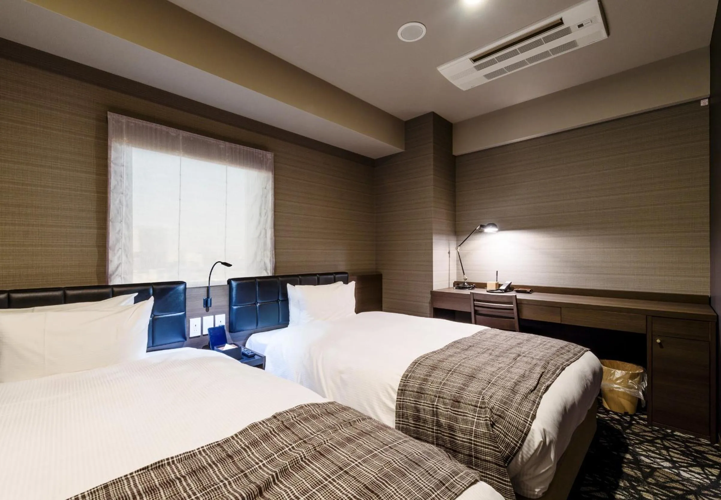 Photo of the whole room, Bed in QuintessaHotel TokyoHaneda Comic&Books