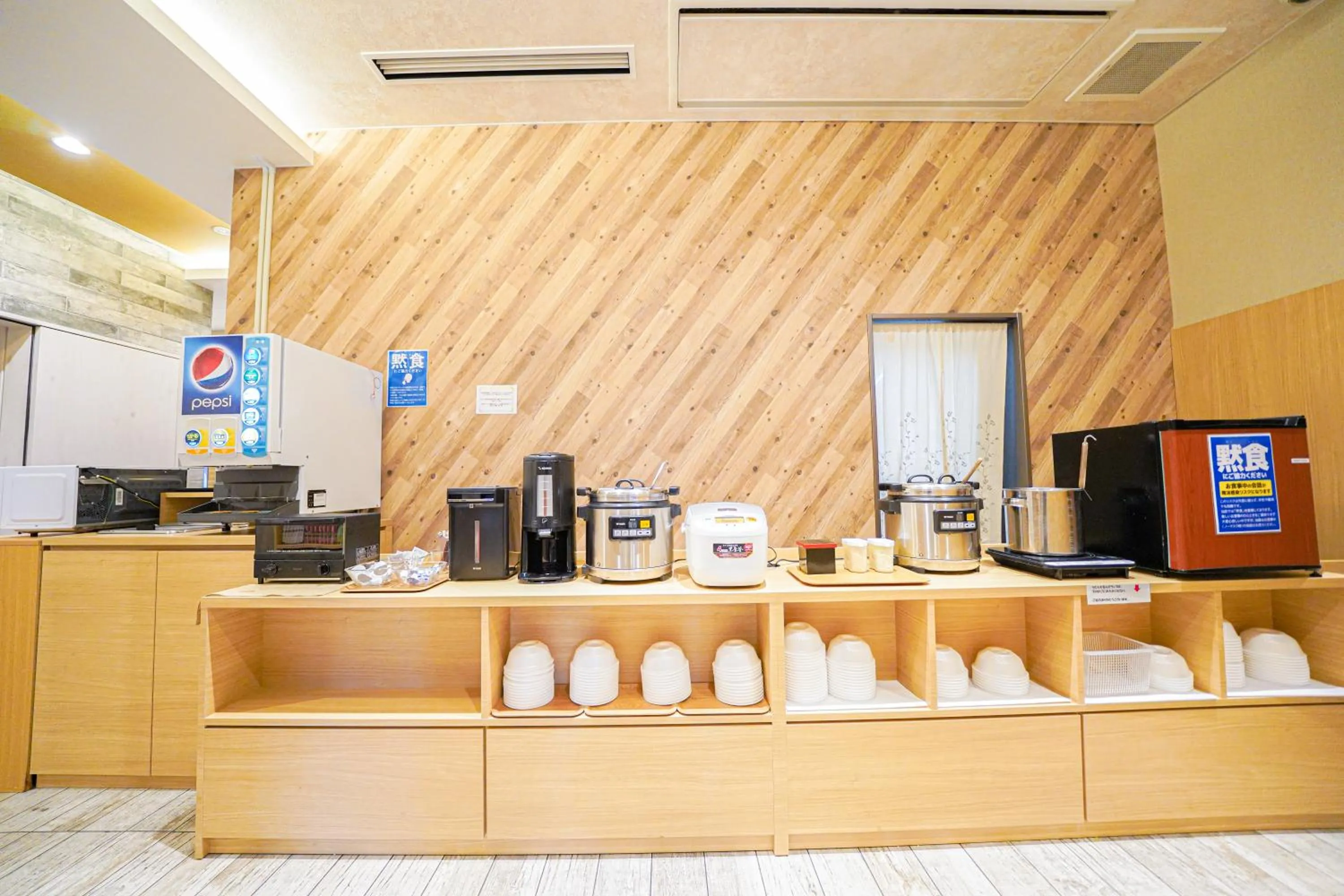 Communal lounge/ TV room in QuintessaHotel TokyoHaneda Comic&Books