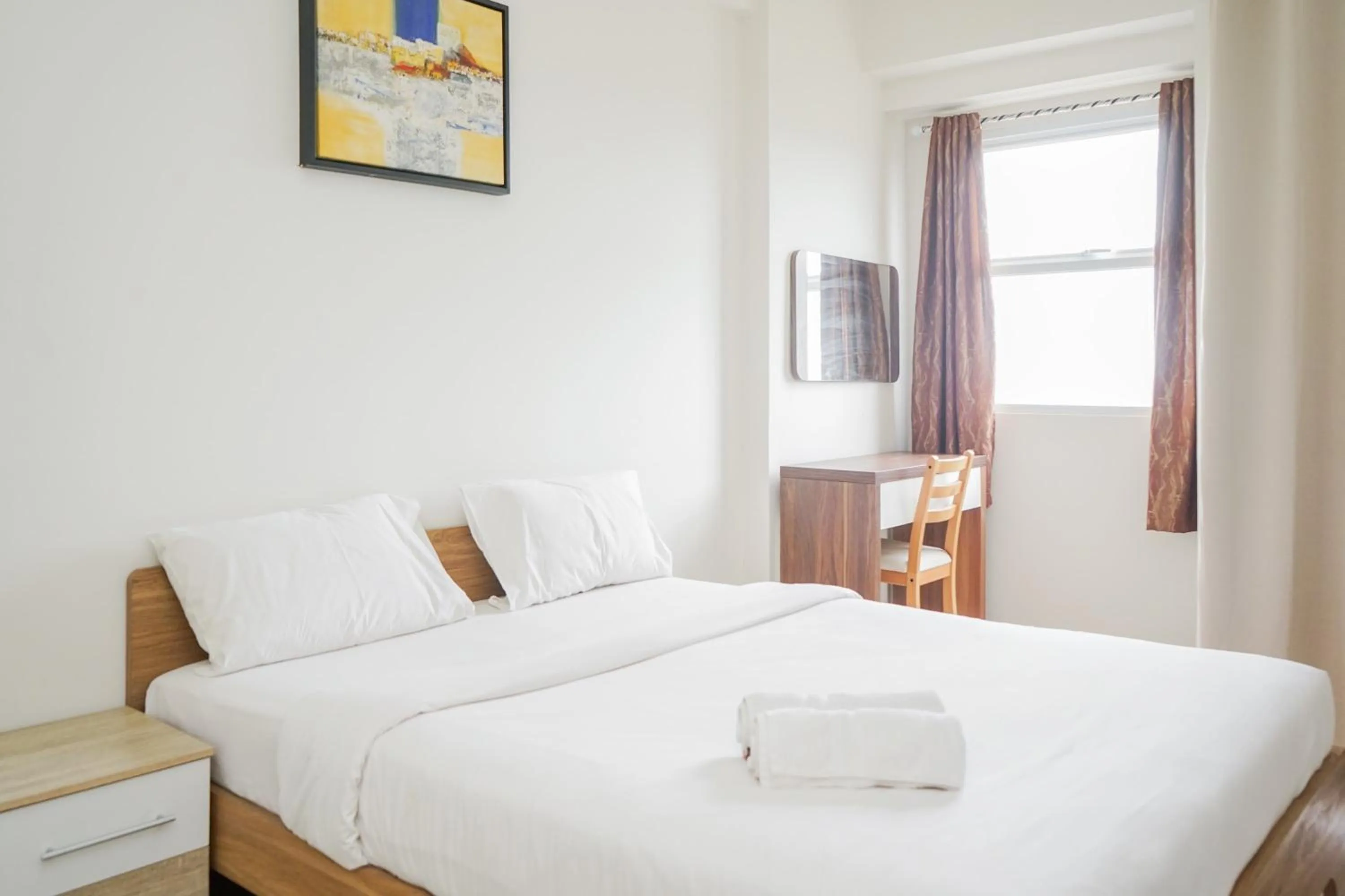 Bedroom in Comfy Studio with Minimalist Design Parkland Avenue Apartment By Travelio