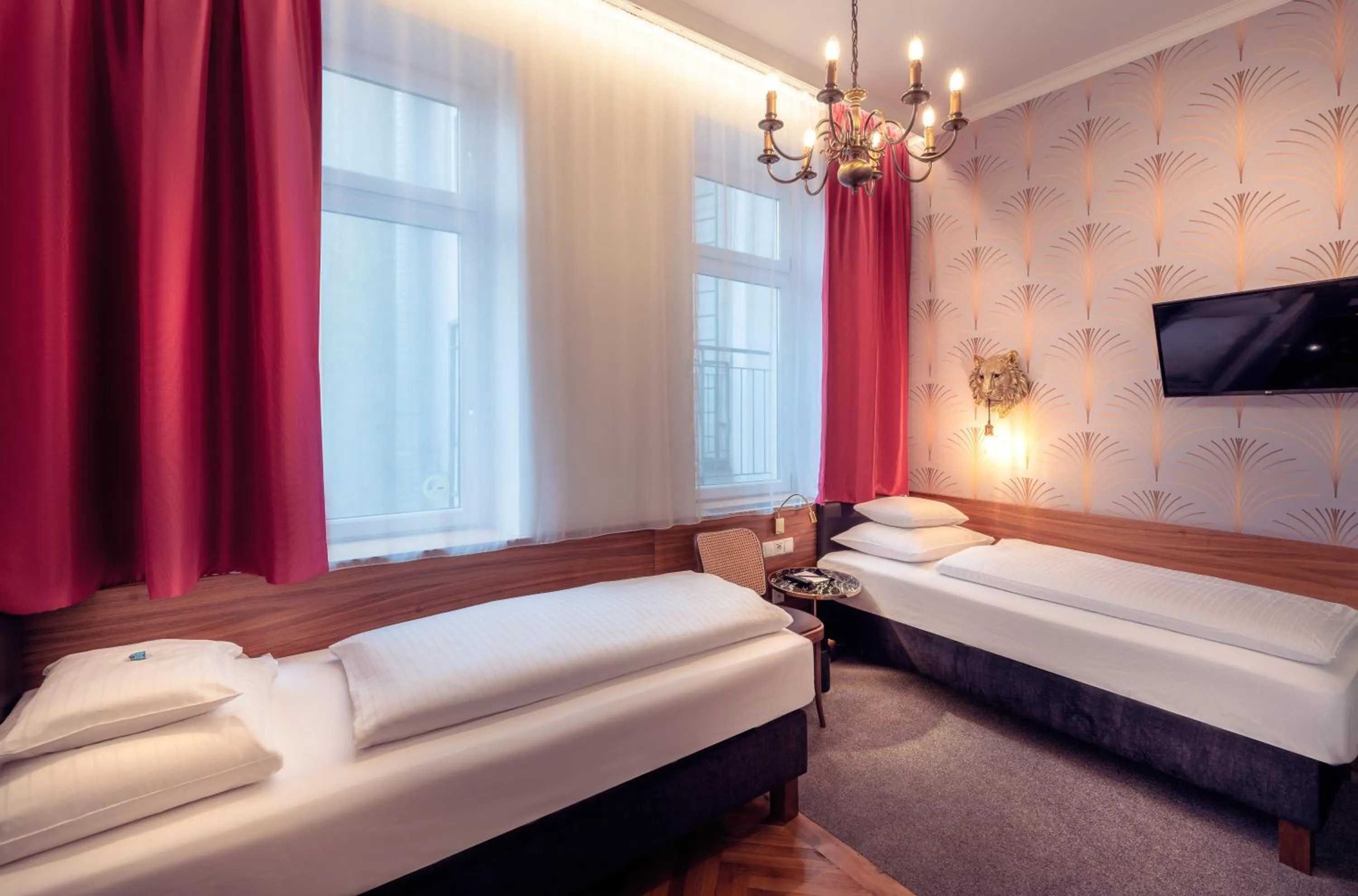 Bed in BoutiqueHOTEL Donauwalzer