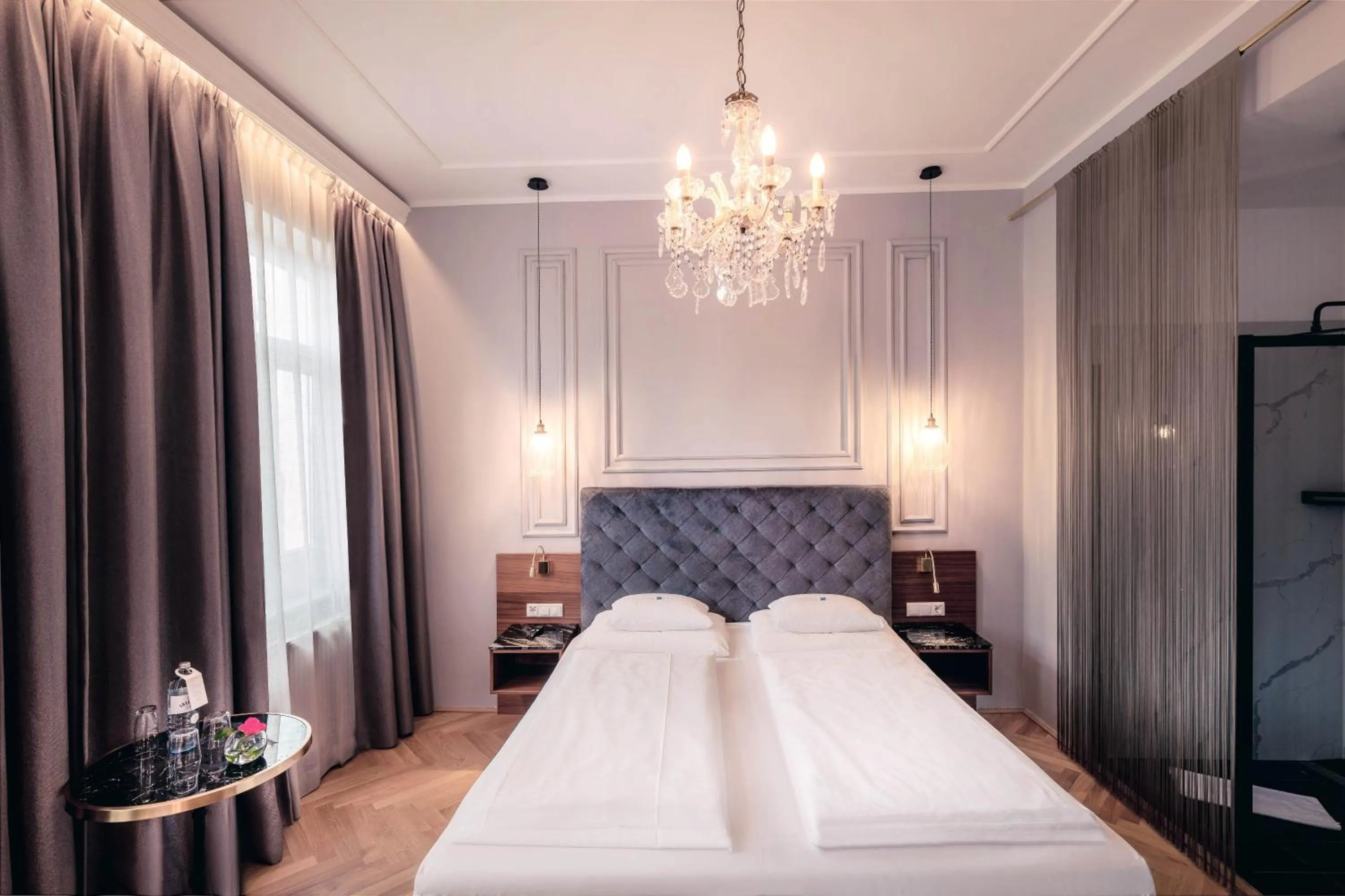 Photo of the whole room, Bed in BoutiqueHOTEL Donauwalzer