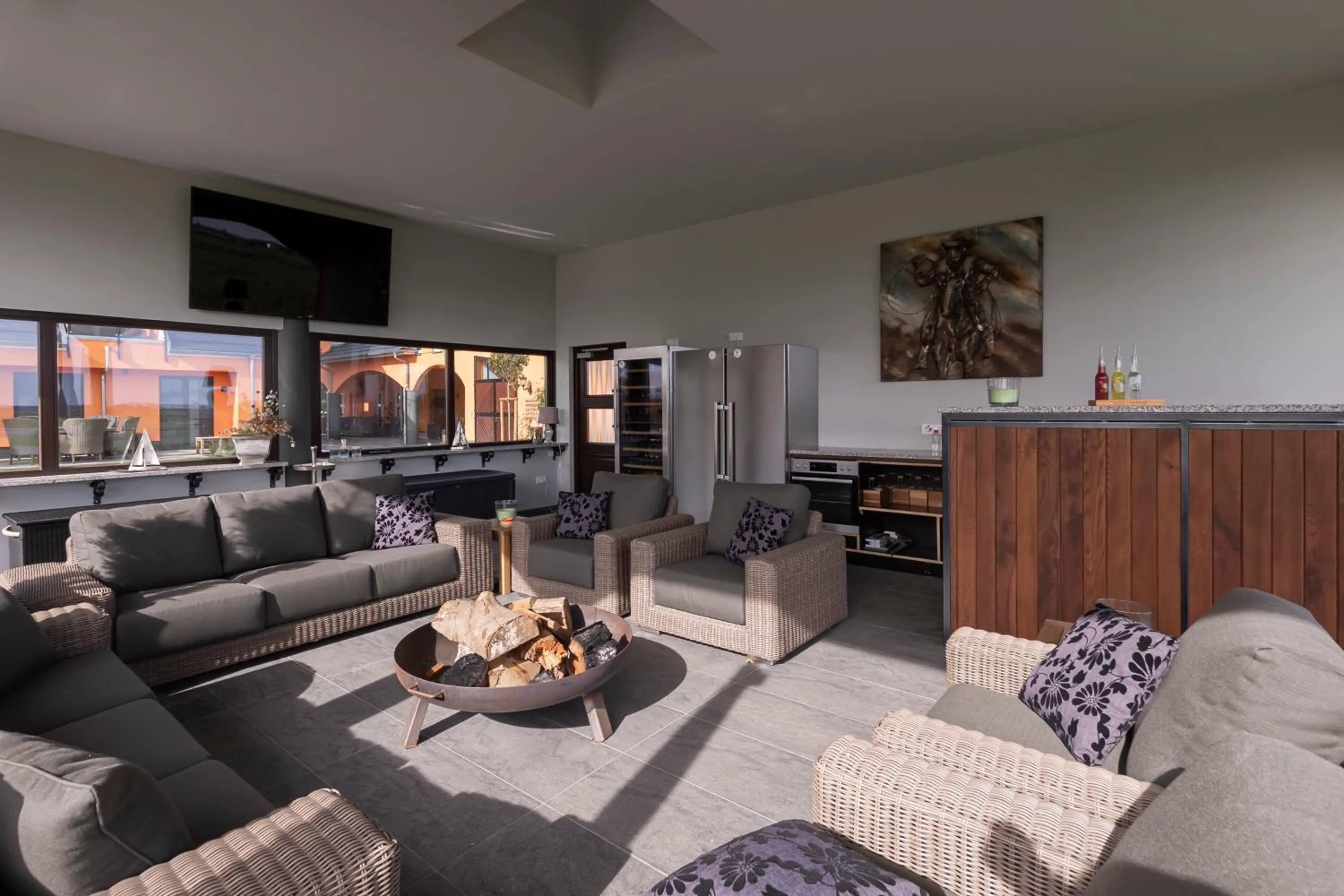 Communal lounge/ TV room in Luxus Resort Rügen Residenz Kubitzer Bodden