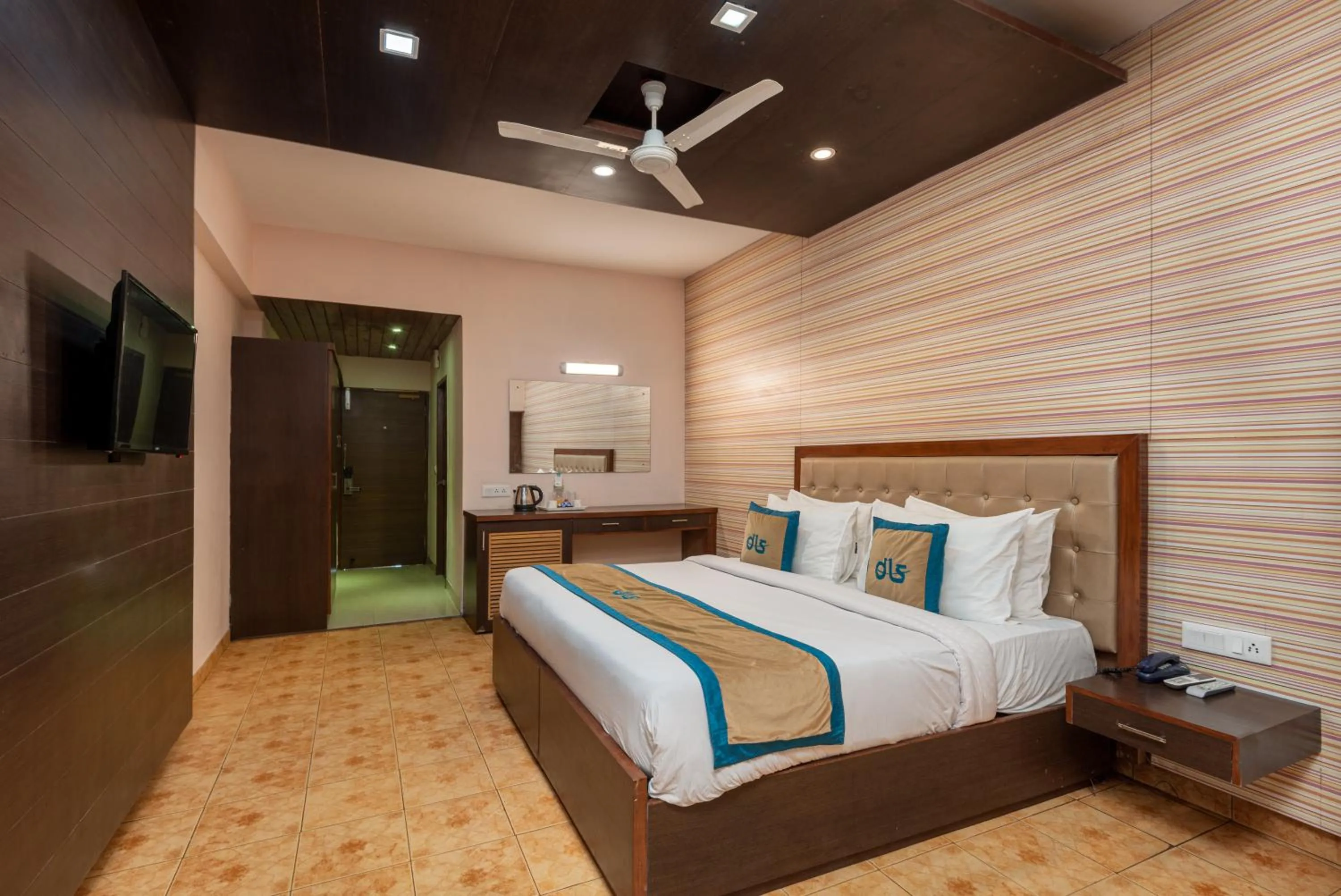 Bed in Spring Valley Resorts by DLS Hotels