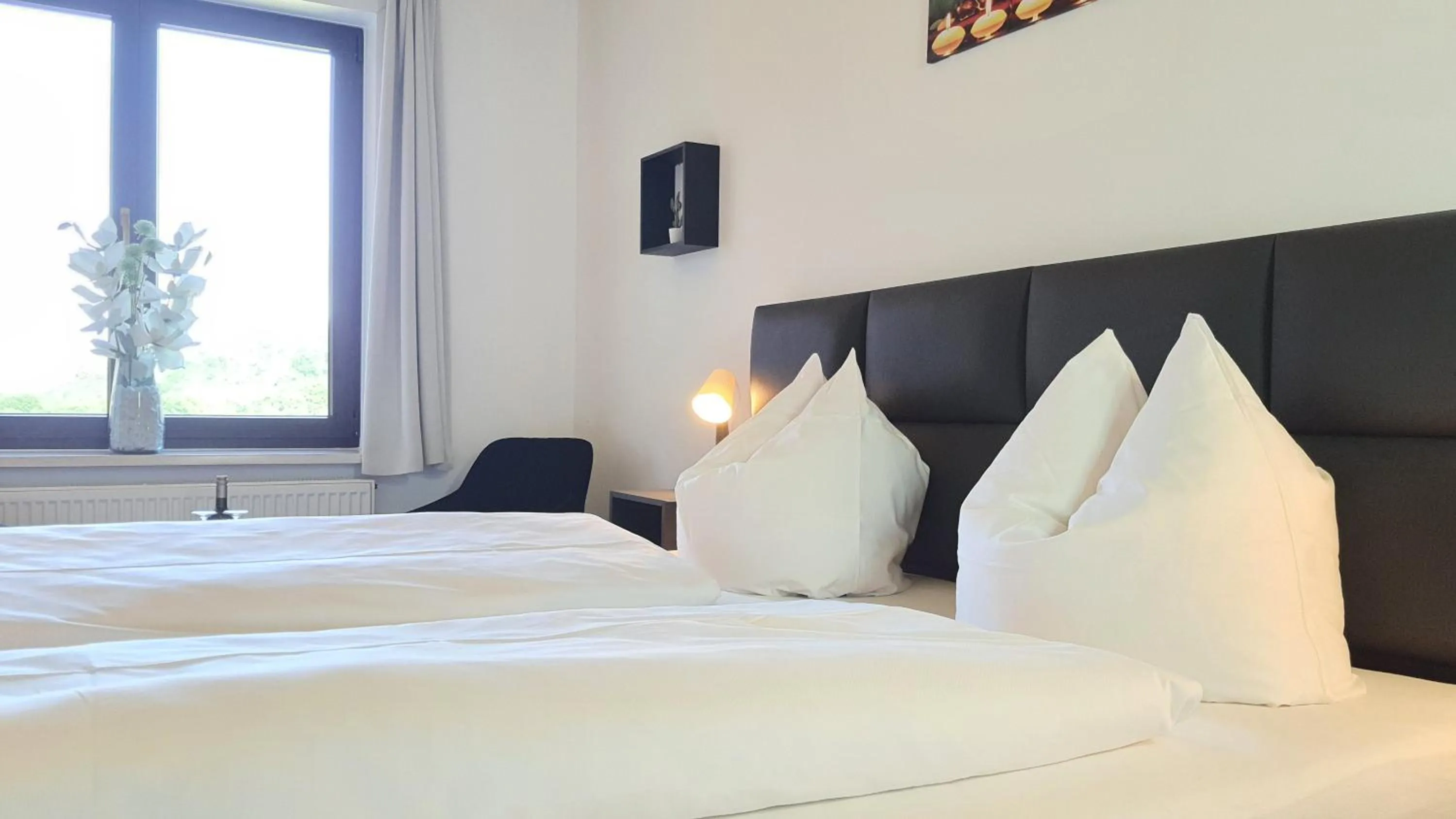 Bed in Hotel Schneiderhof