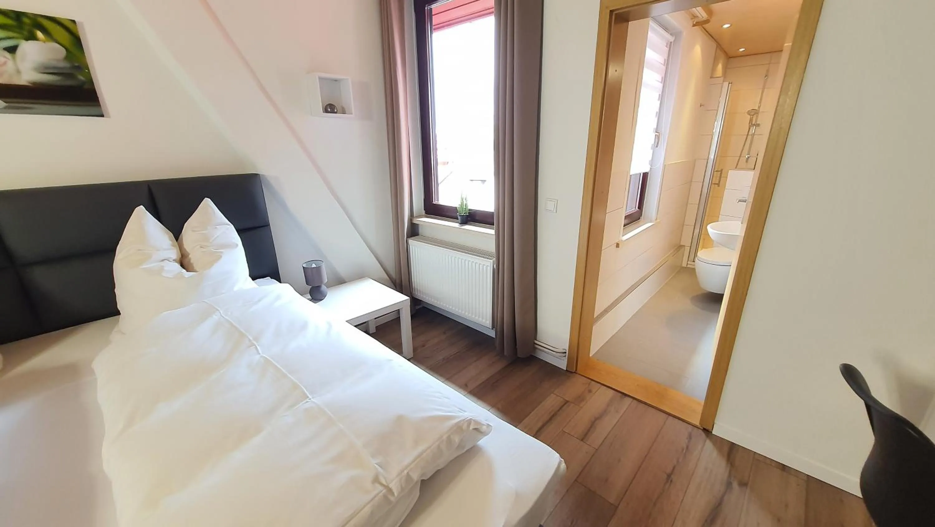 Bed in Hotel Schneiderhof