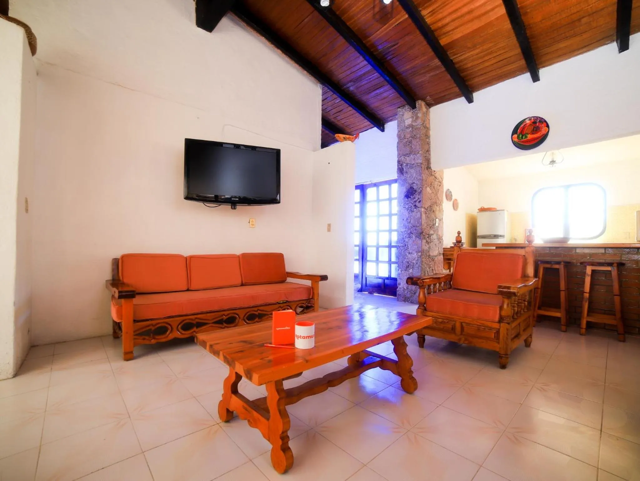 Communal lounge/ TV room in Casa de las Cruces Taxco
