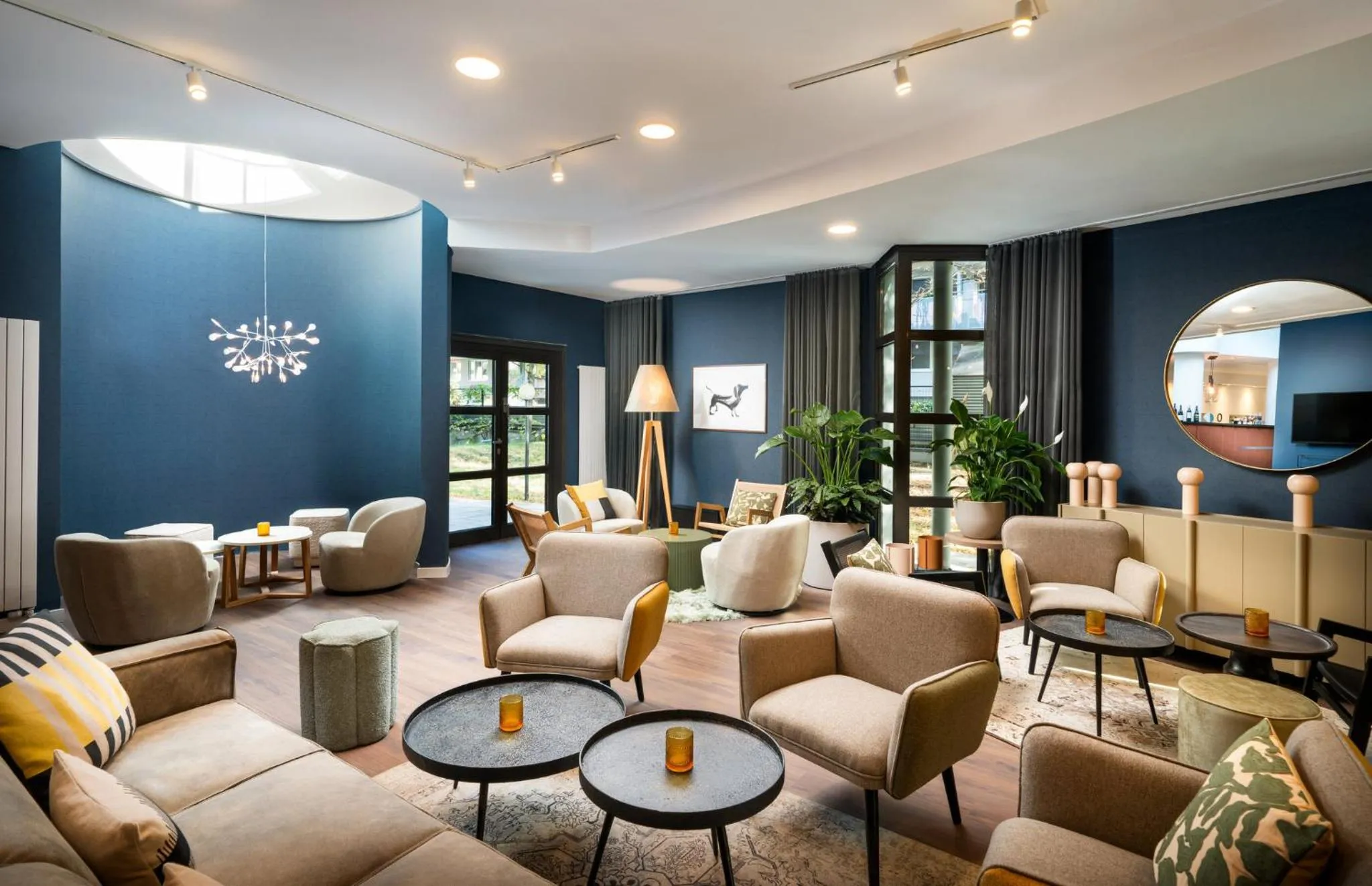 Lounge or bar in voco Vienna Prater by IHG