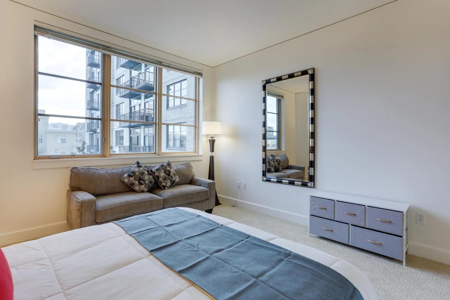 Bed in Renu Suites at The Burlington Portland