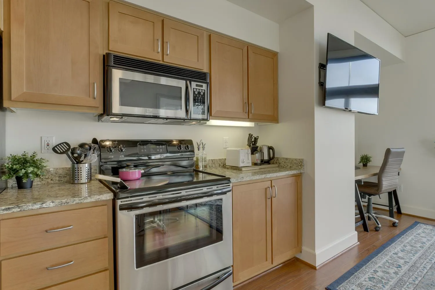 Kitchen or kitchenette in Renu Suites at The Burlington Portland