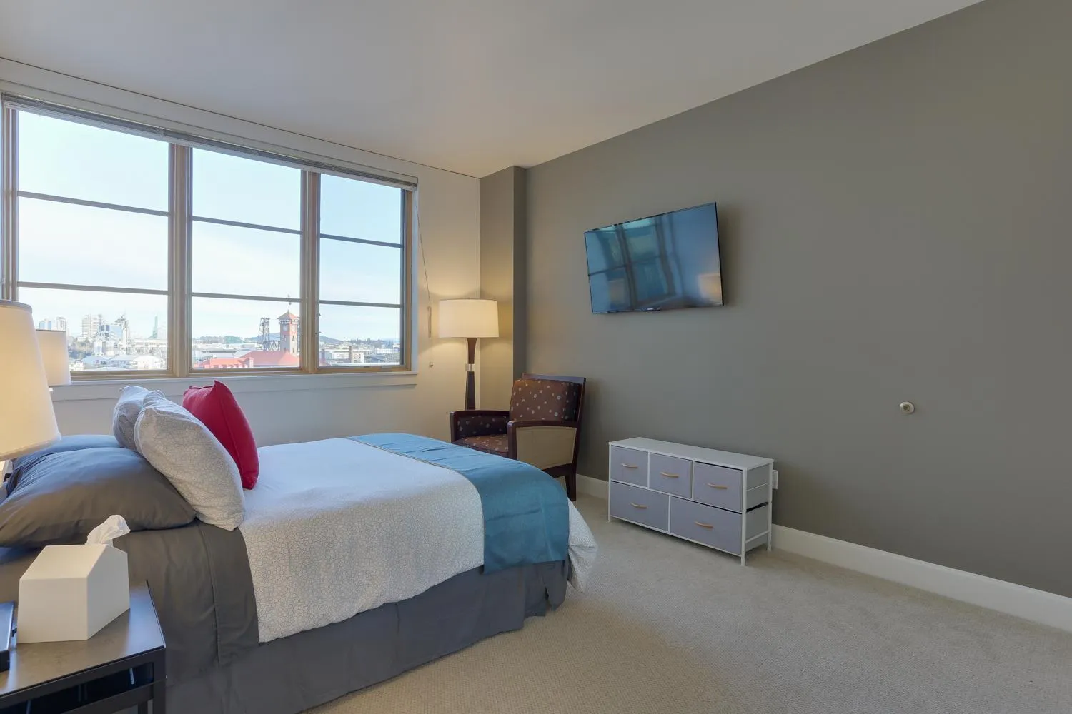 Bed in Renu Suites at The Burlington Portland