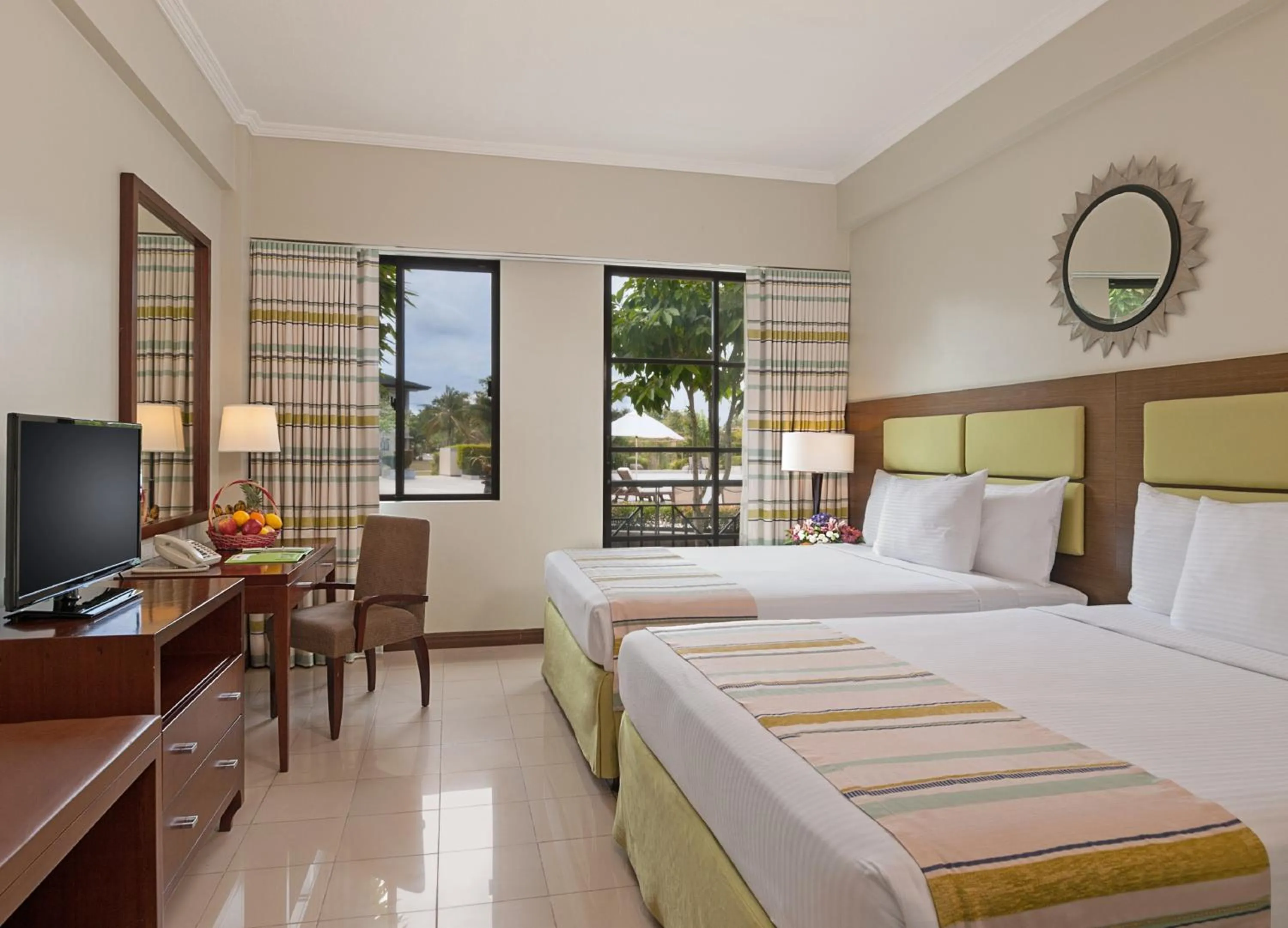 Photo of the whole room, Bed in Holiday Inn & Suites Batangas LimaPark by IHG