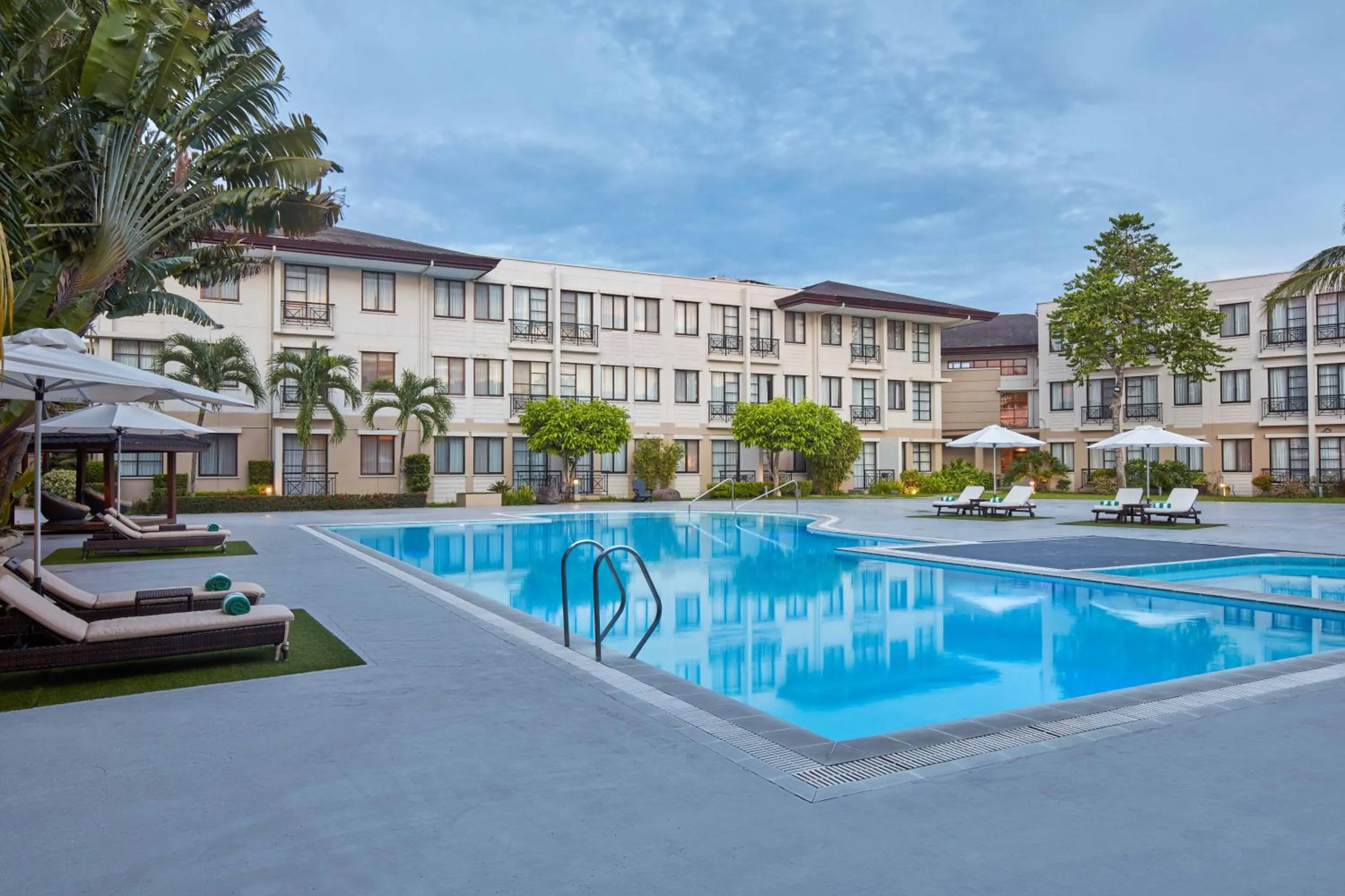 Pool view in Holiday Inn & Suites Batangas LimaPark by IHG