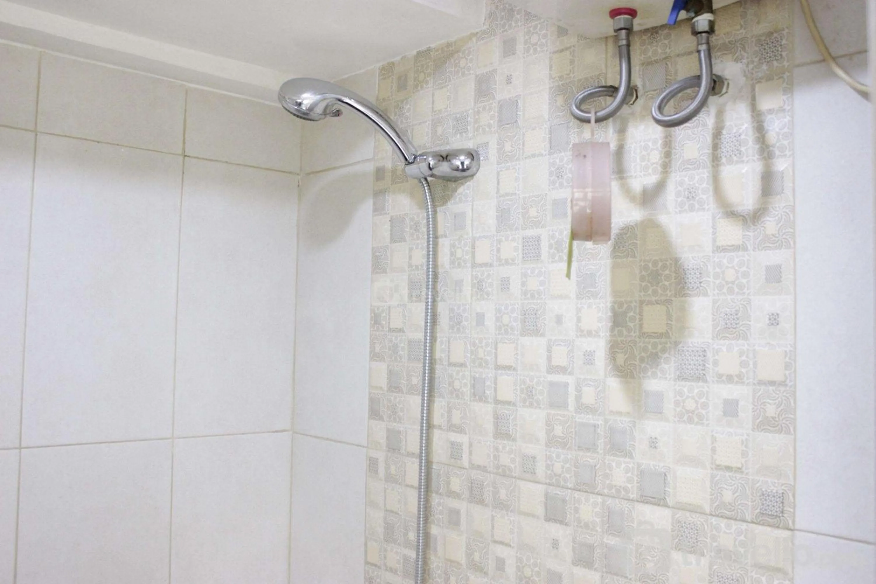 Bed in Private & Stylish 2BR at Gateway Apartment Ahmad Yani Cicadas By Travelio