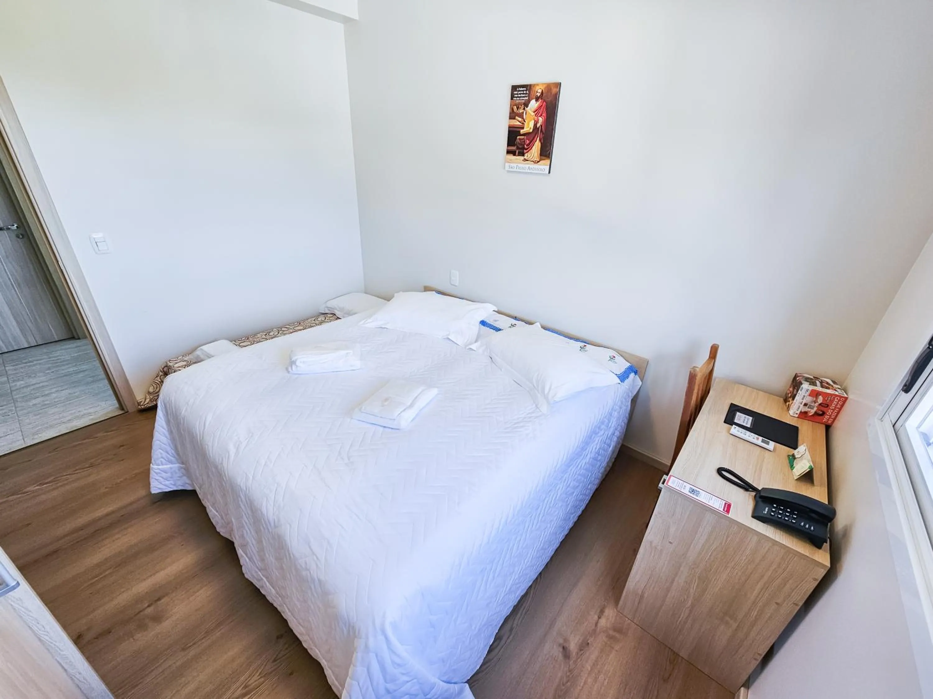 Bed in Pousada Bom Pastor