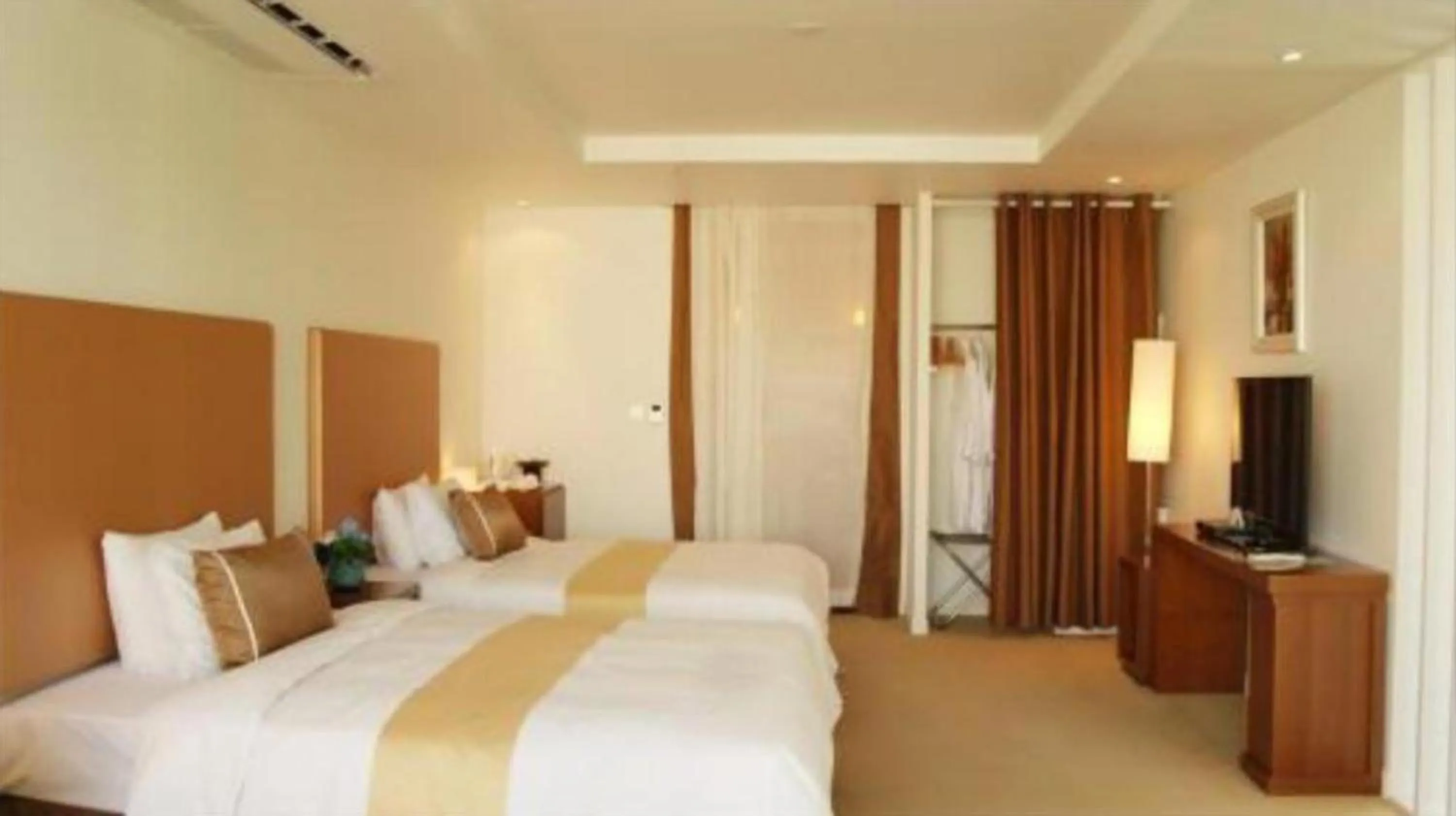 Bed in Ecograd Hotel