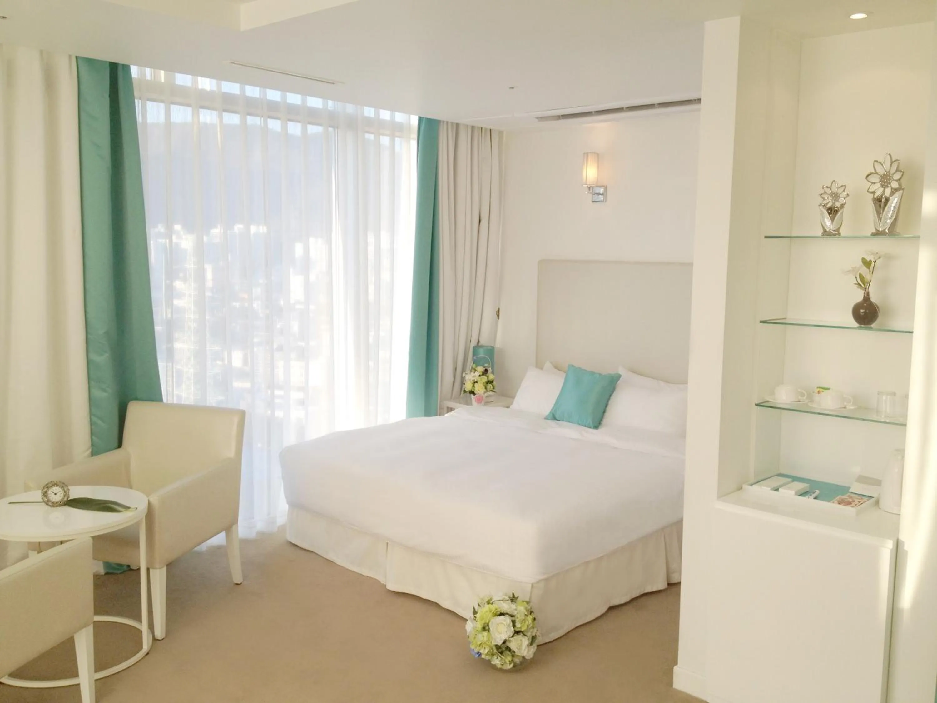 Bed in Ecograd Hotel