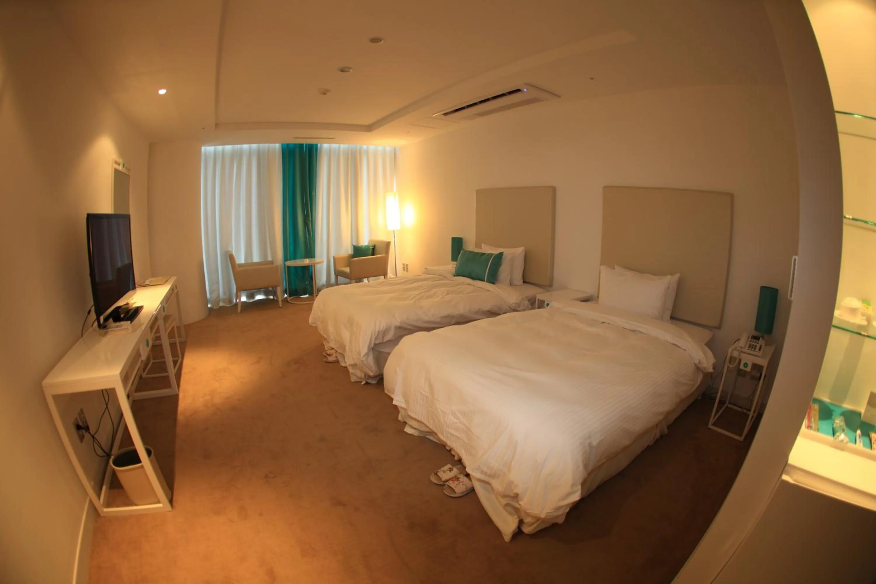 Bed in Ecograd Hotel