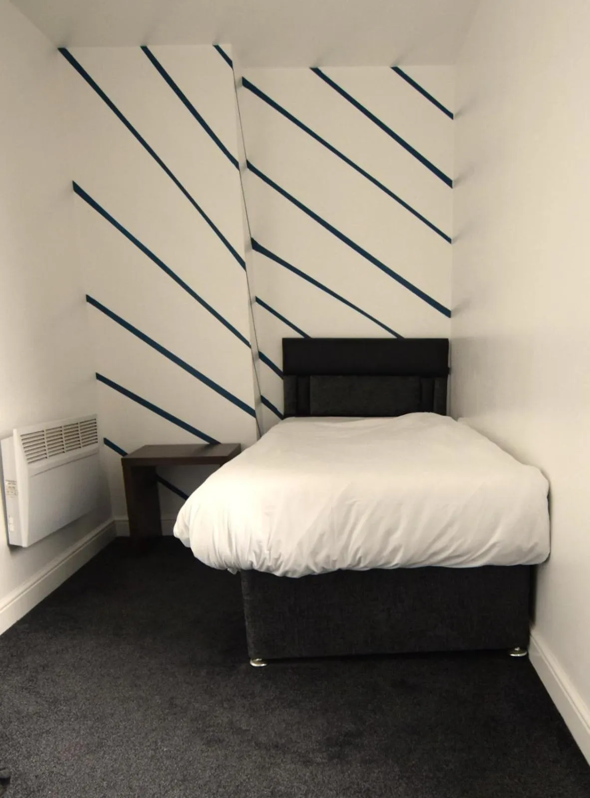 Bedroom, Bed in OYO Victoria Apartments