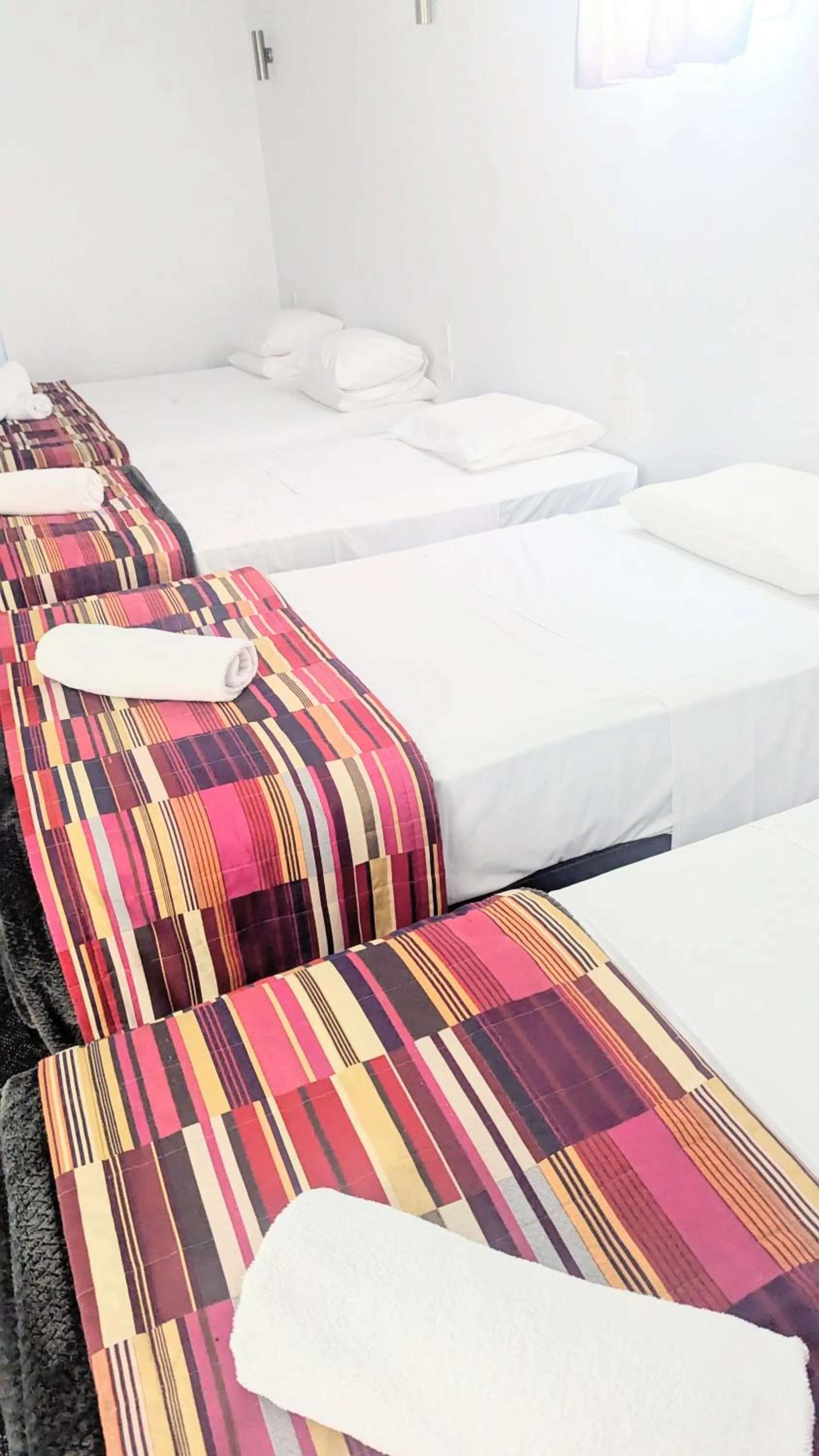 Bed in PROSERPINE MOTOR LODGE