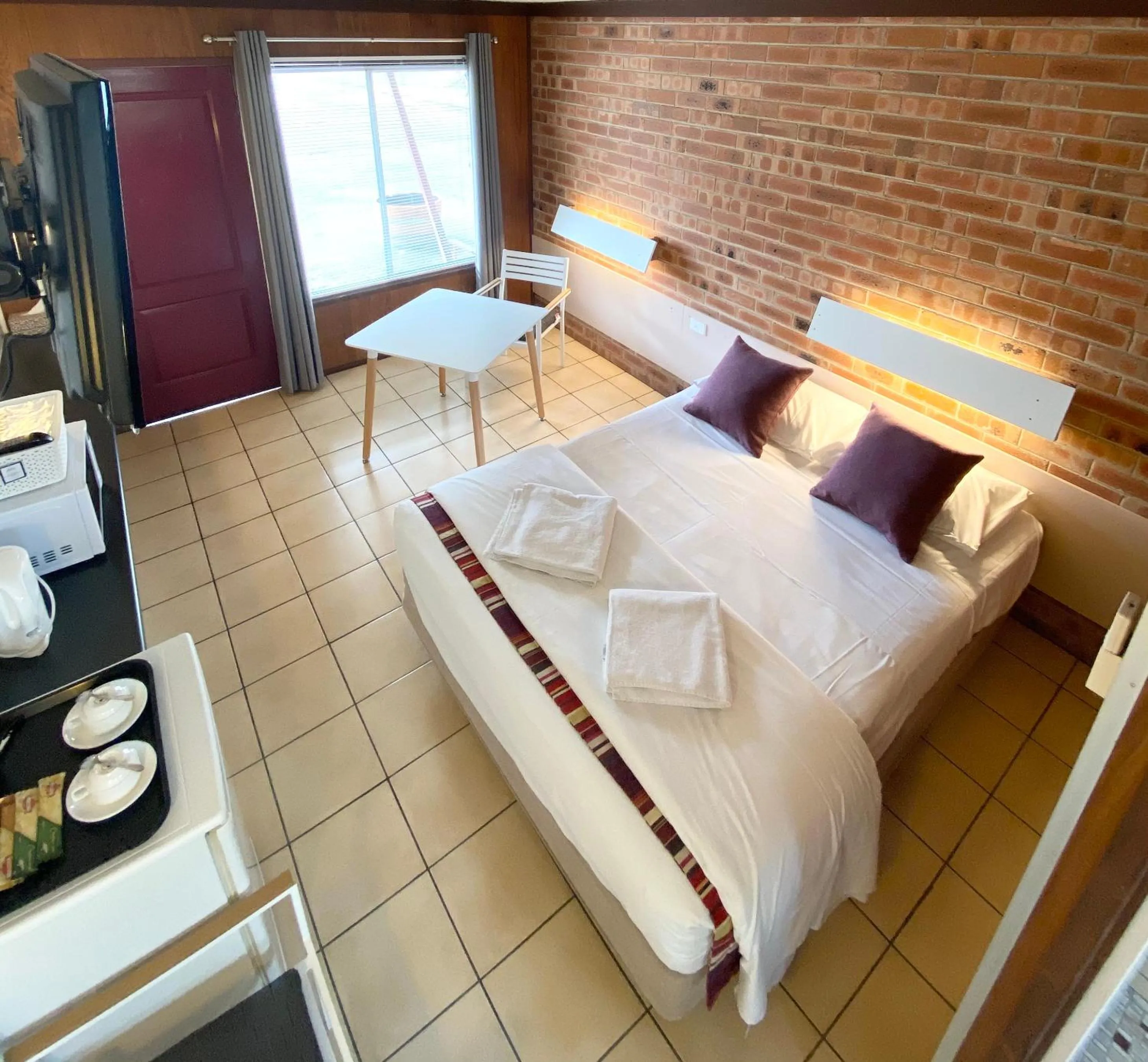 Photo of the whole room, Bed in PROSERPINE MOTOR LODGE