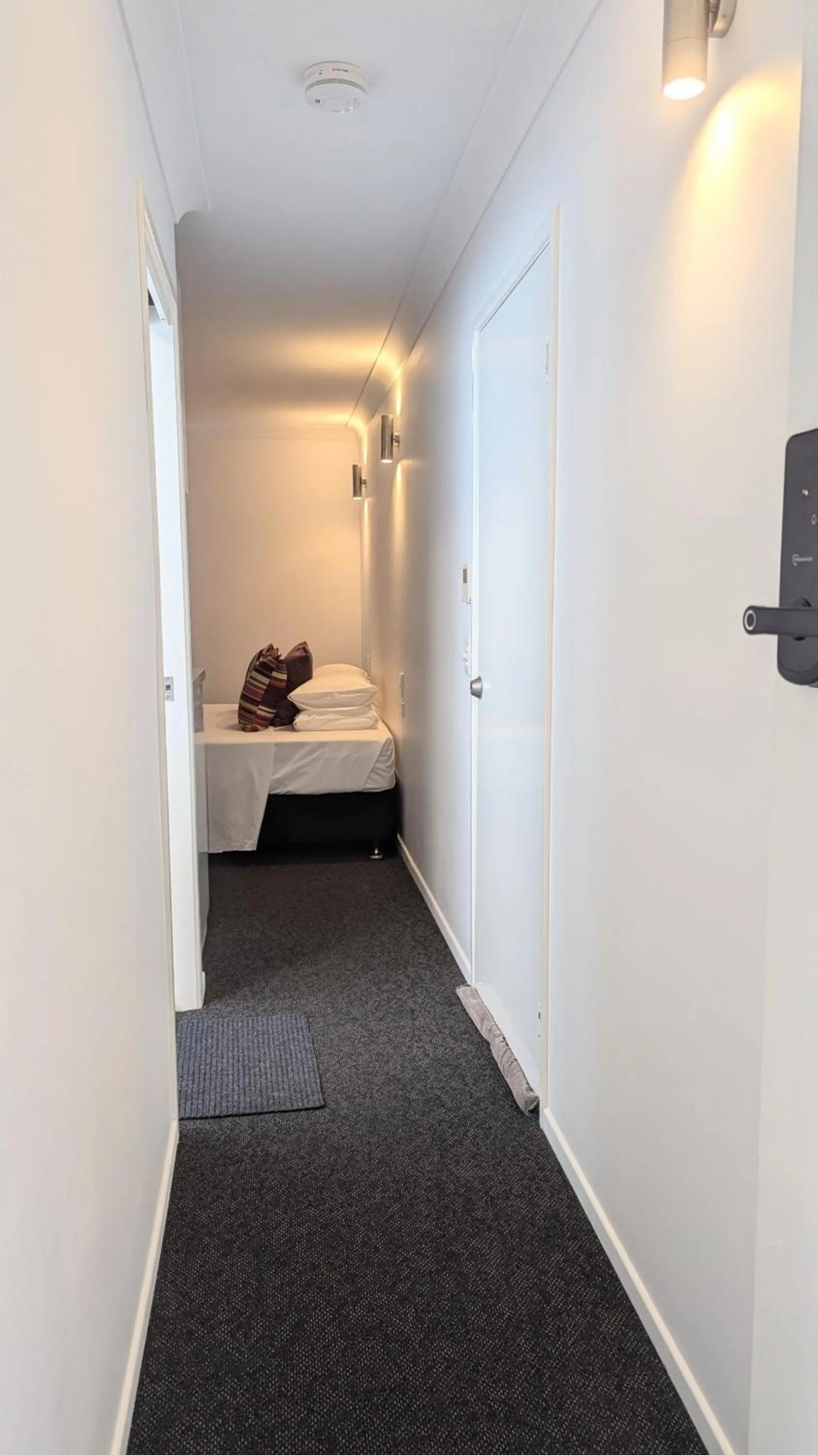 Bed in PROSERPINE MOTOR LODGE