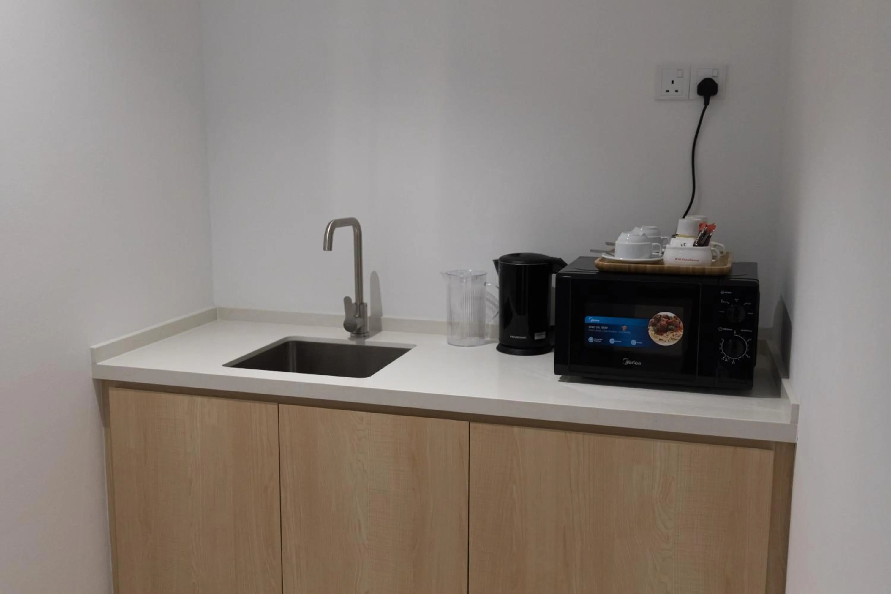 Kitchen or kitchenette in The Journey hotel