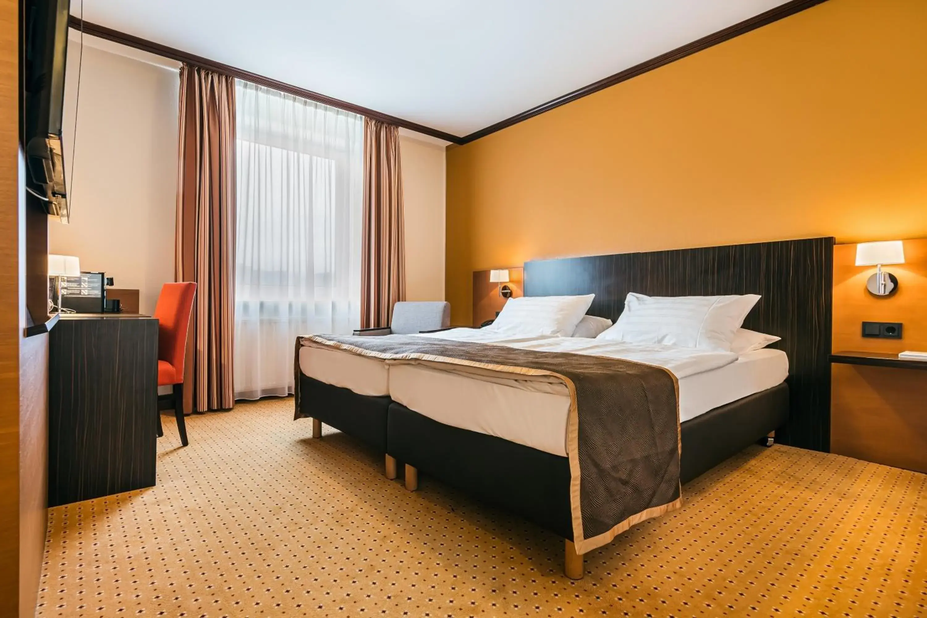 Comfort double room with twin beds and connecting door in Trans World Hotel Donauwelle Comfort double room with twin beds and connecting door in Trans World Hotel Donauwelle