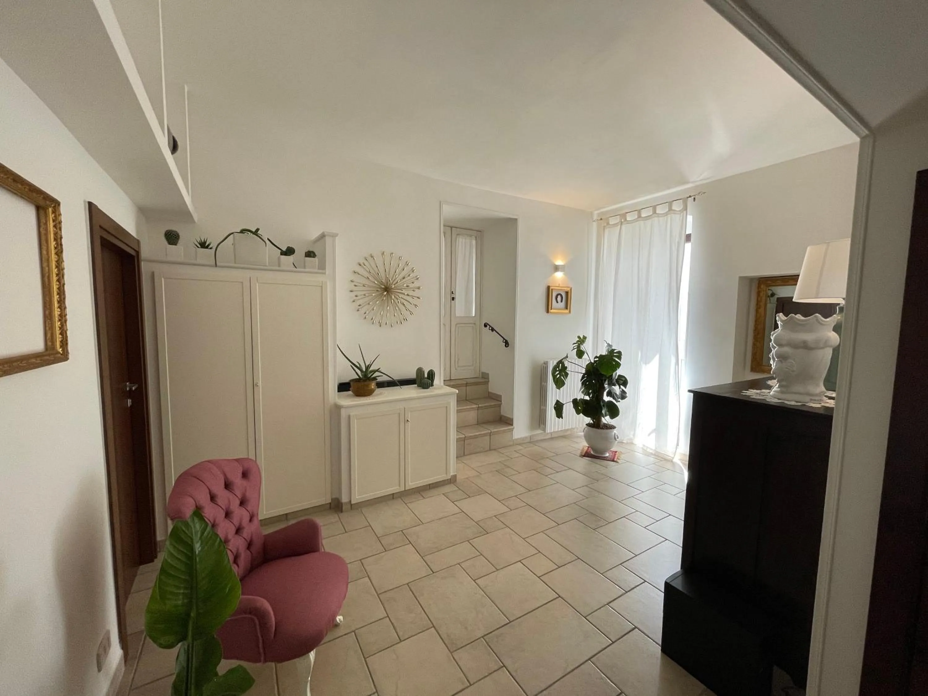 Communal lounge/ TV room in Dimora Bellini Apartment and Rooms