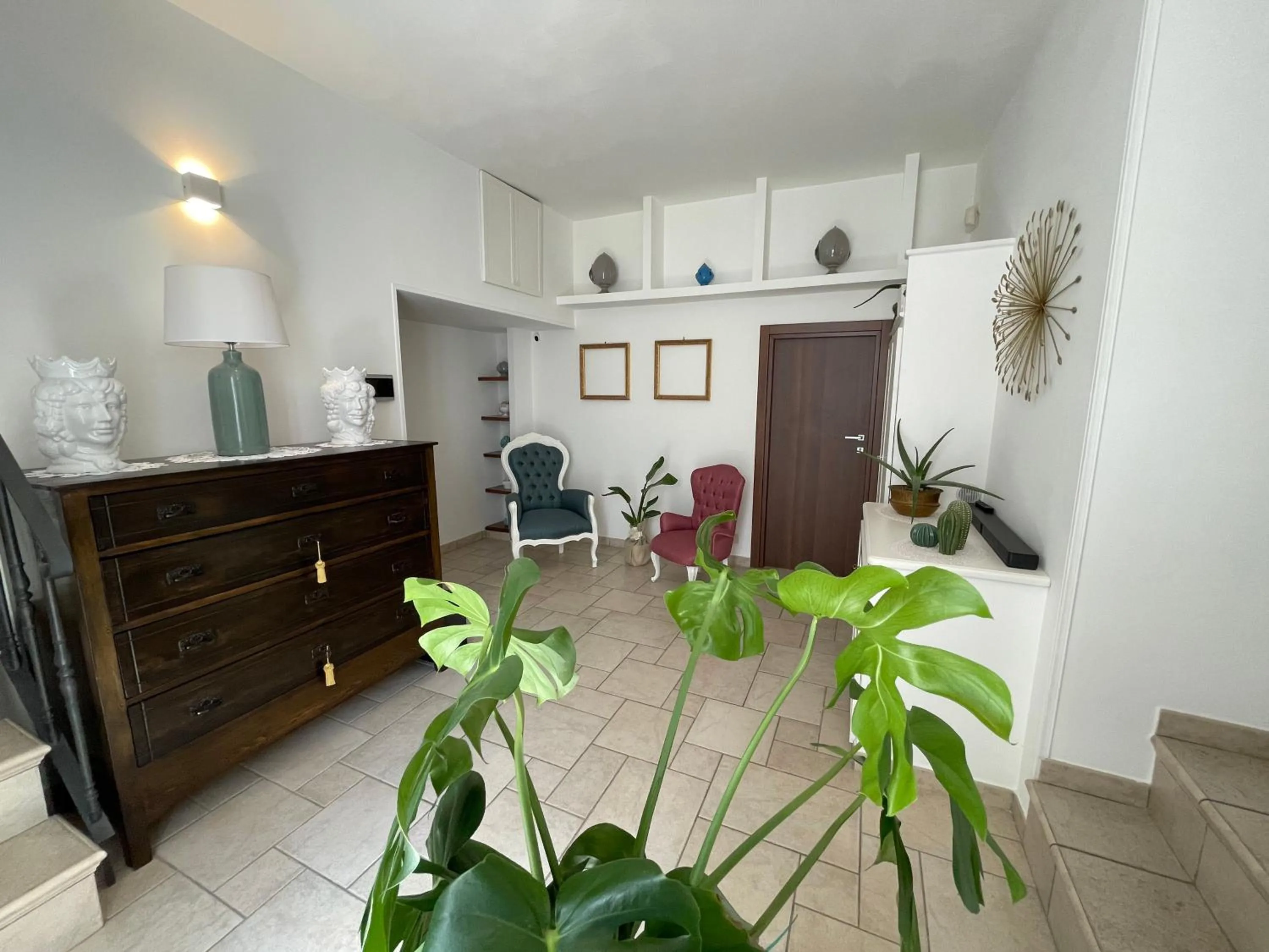 Communal lounge/ TV room in Dimora Bellini Apartment and Rooms