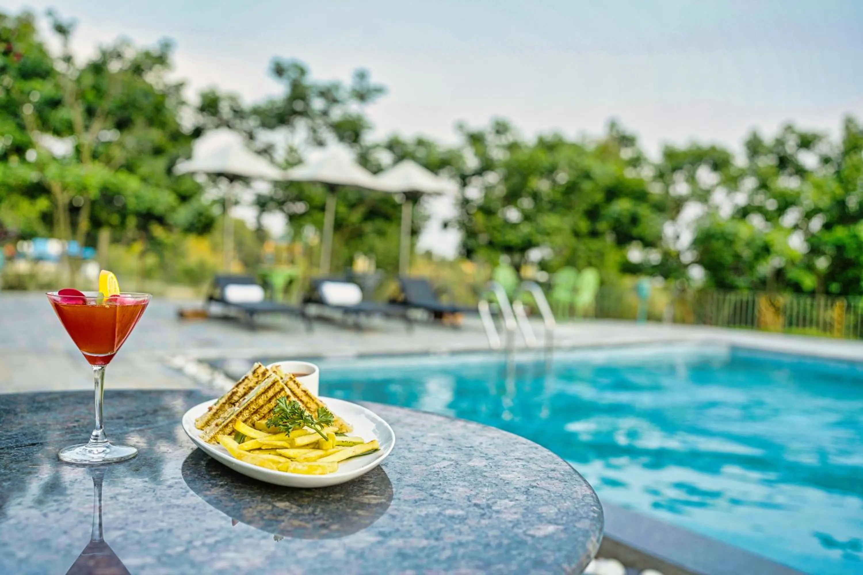 Swimming pool in The Atman Dharamshala by Leisure Hotels