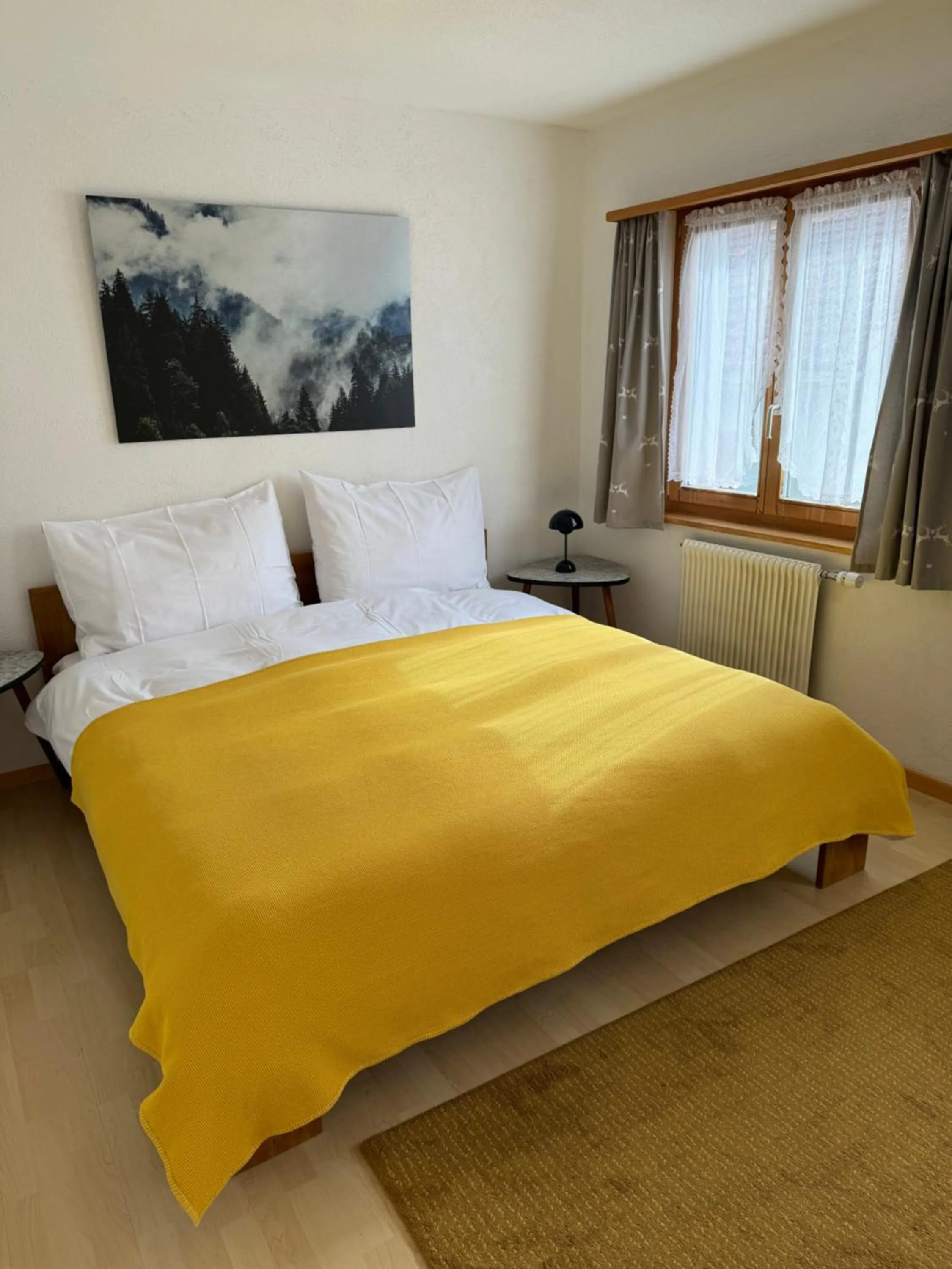 Photo of the whole room, Bed in Waldheim Laax Pension