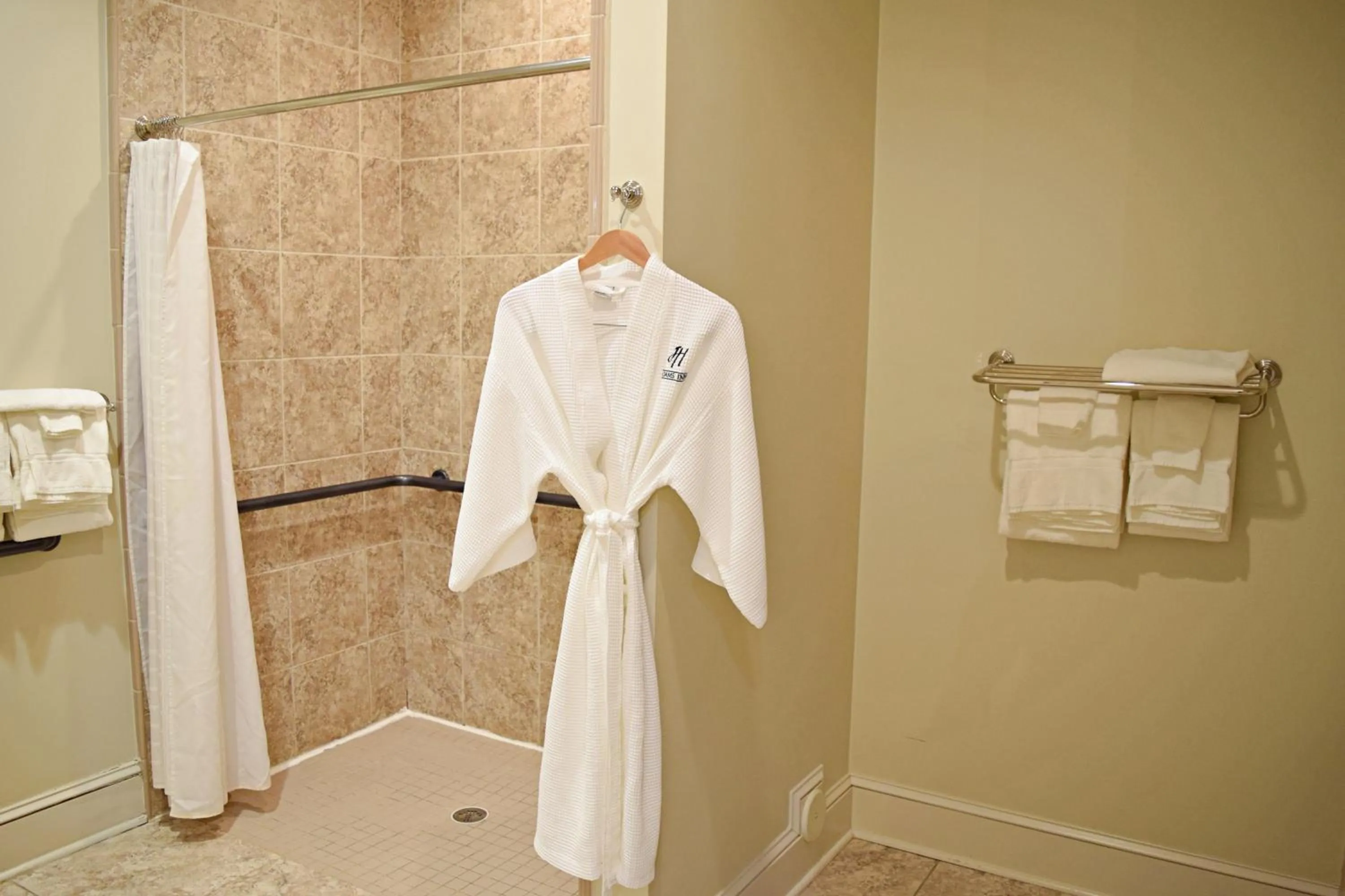 Shower in JH Adams Inn, Trademark Collection by Wyndham