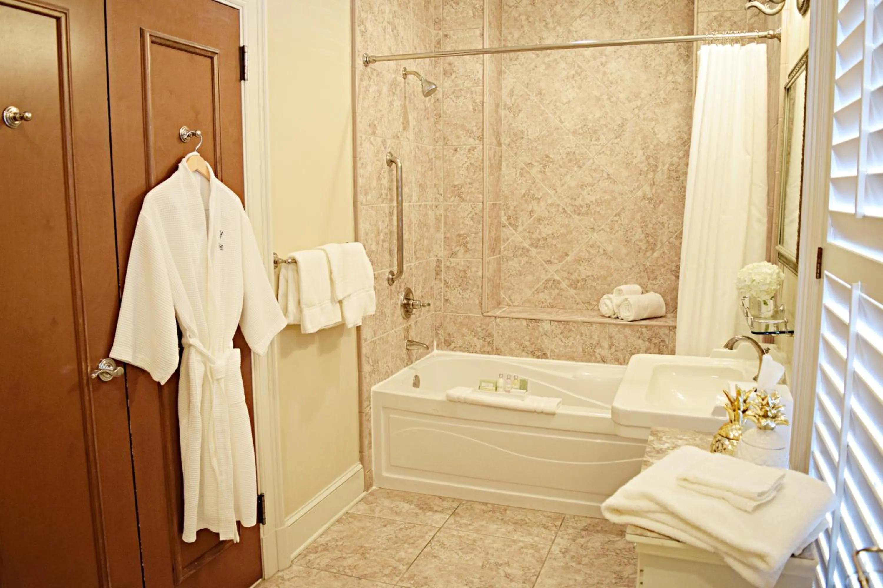 Shower in JH Adams Inn, Trademark Collection by Wyndham