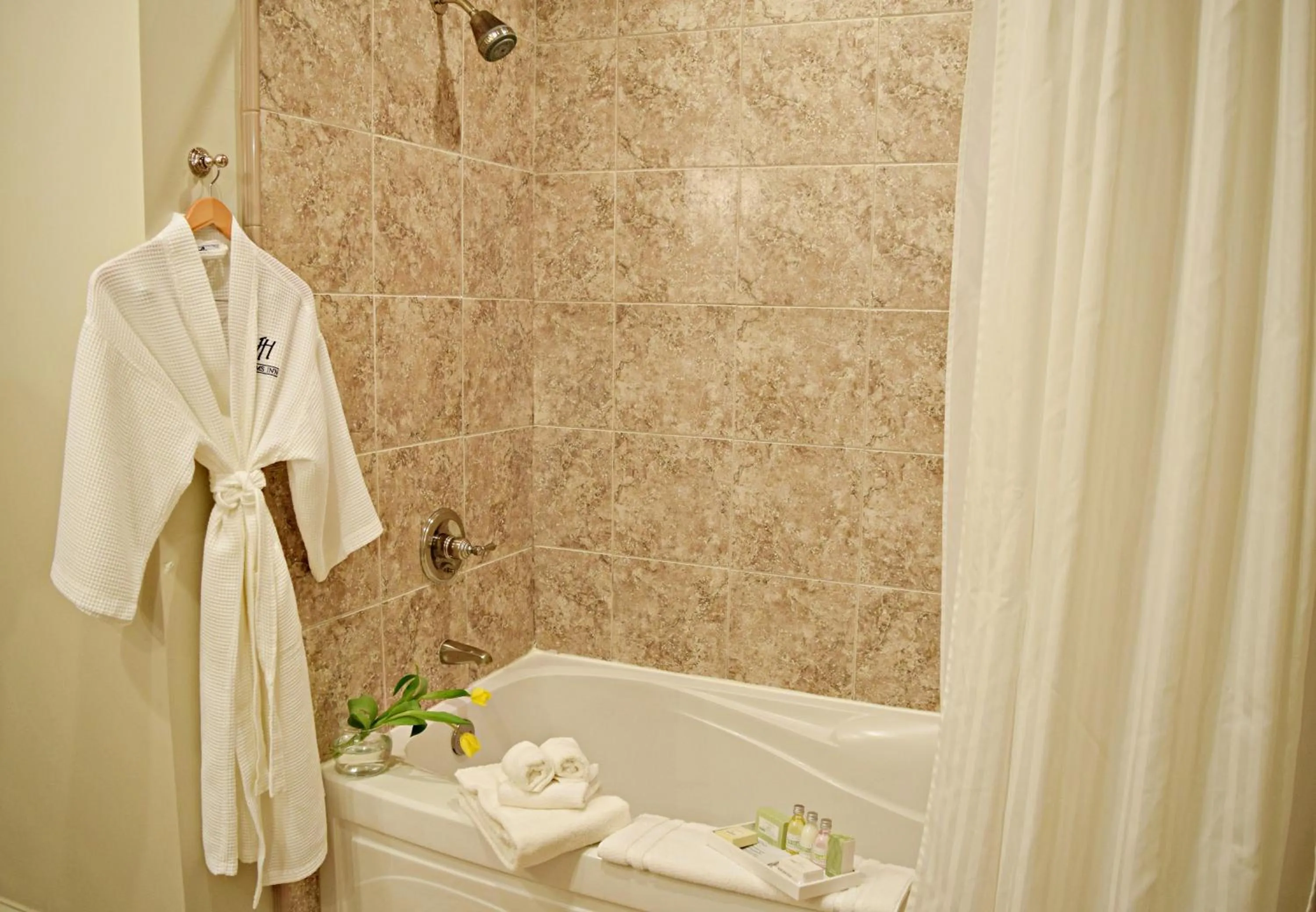Bath in JH Adams Inn, Trademark Collection by Wyndham