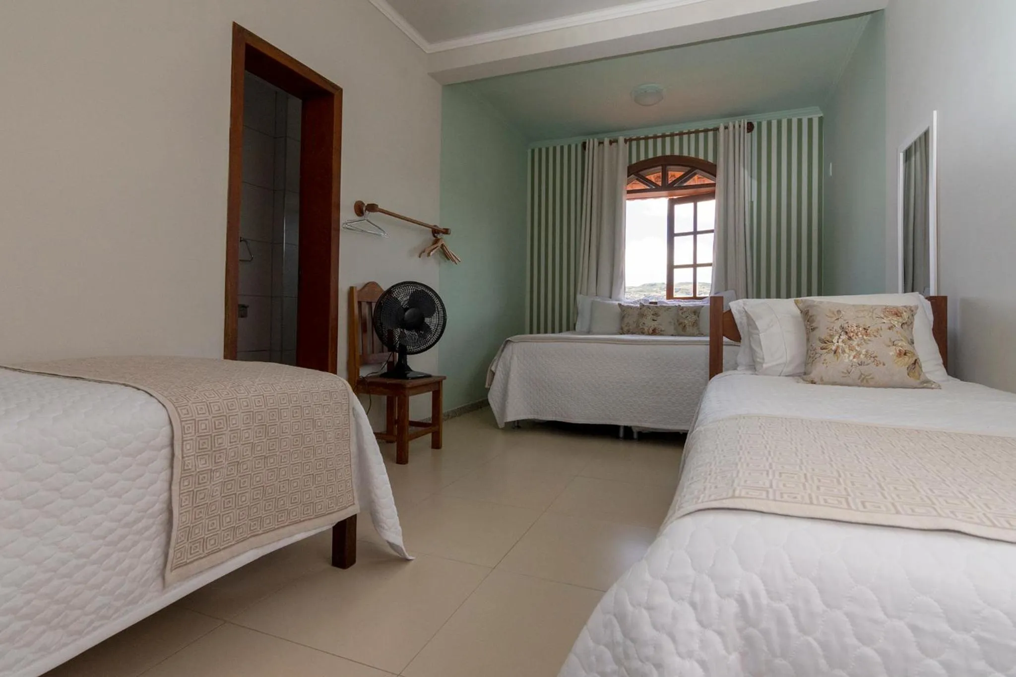 Bed in POUSADA CAPIM LIMÃO