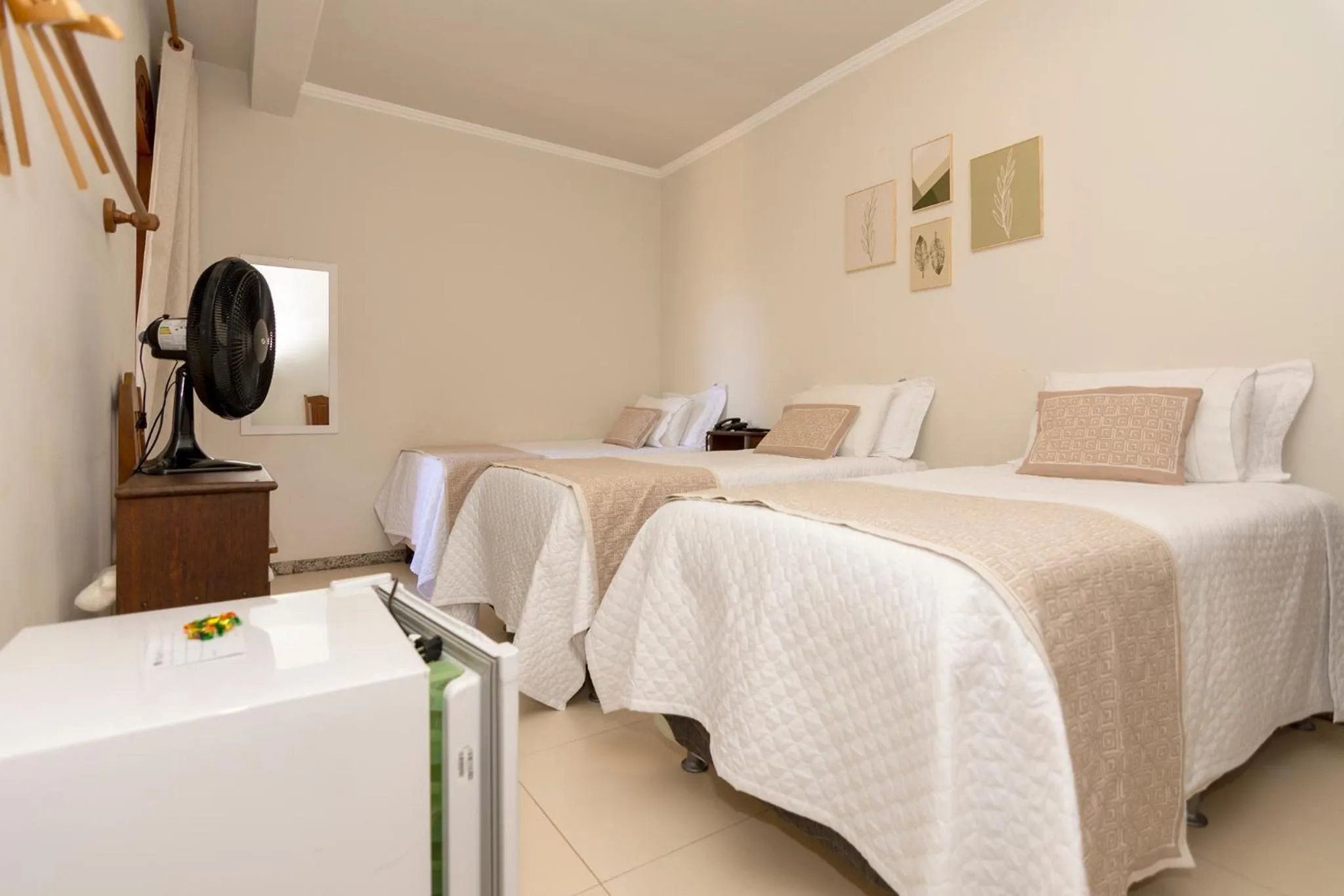 Bed in POUSADA CAPIM LIMÃO