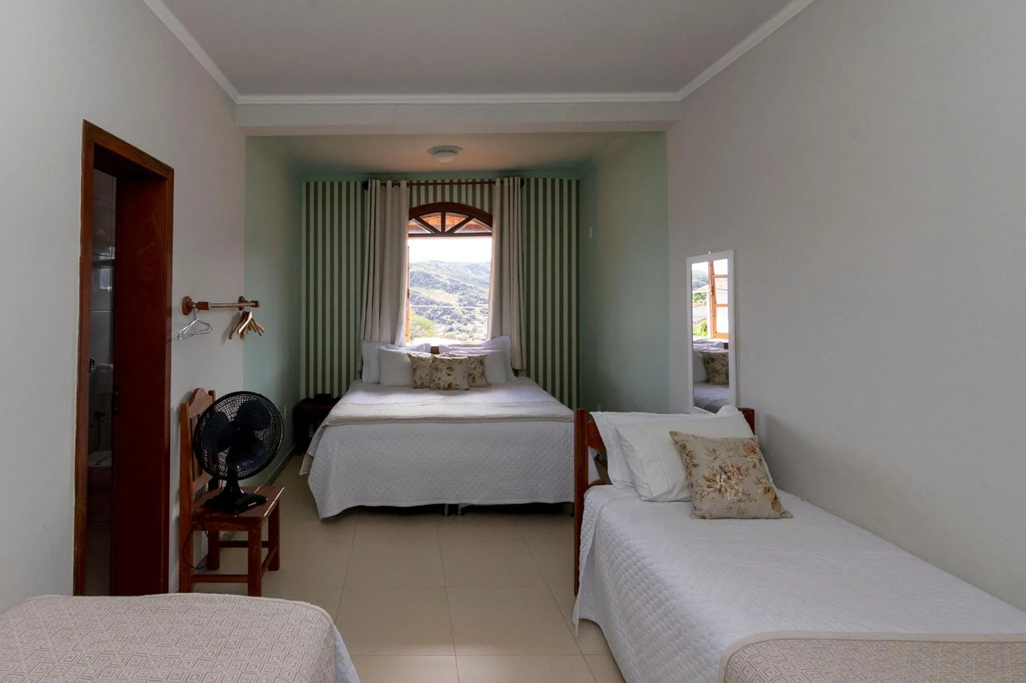 Bed in POUSADA CAPIM LIMÃO