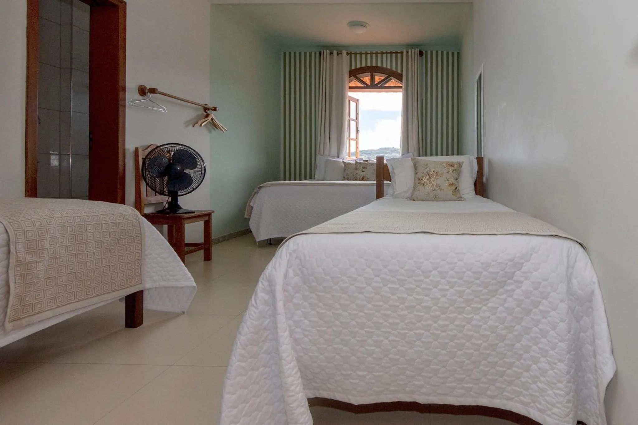 Bed in POUSADA CAPIM LIMÃO