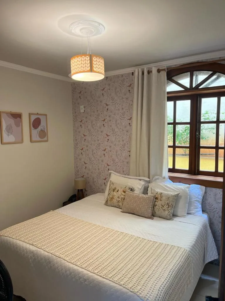 Bed in POUSADA CAPIM LIMÃO