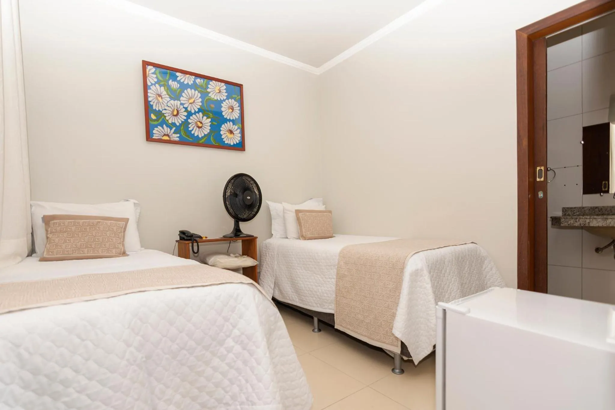 Bed in POUSADA CAPIM LIMÃO