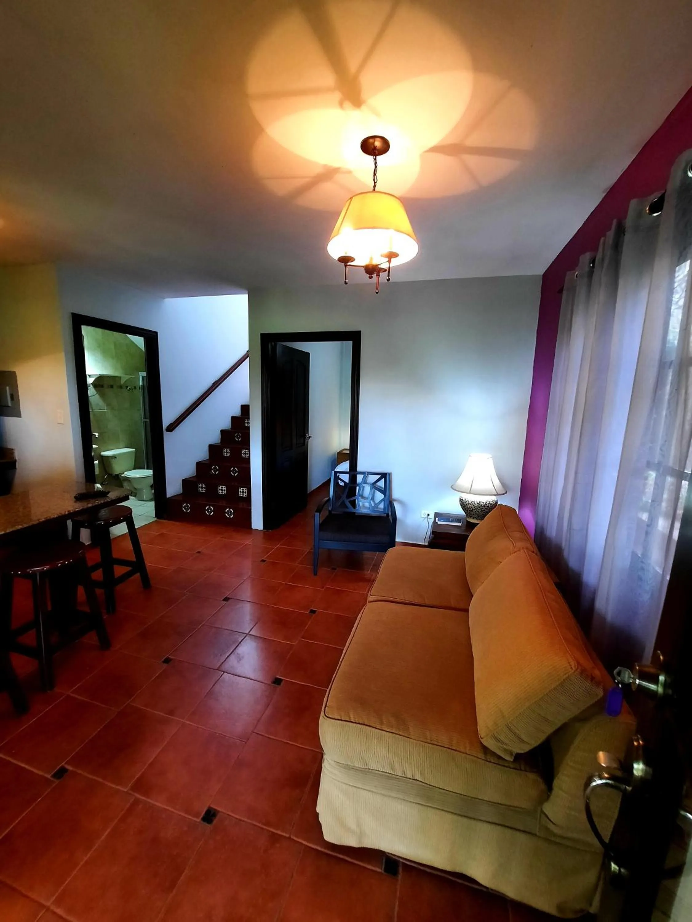 Living room, Bed in Cabañas San Miguel