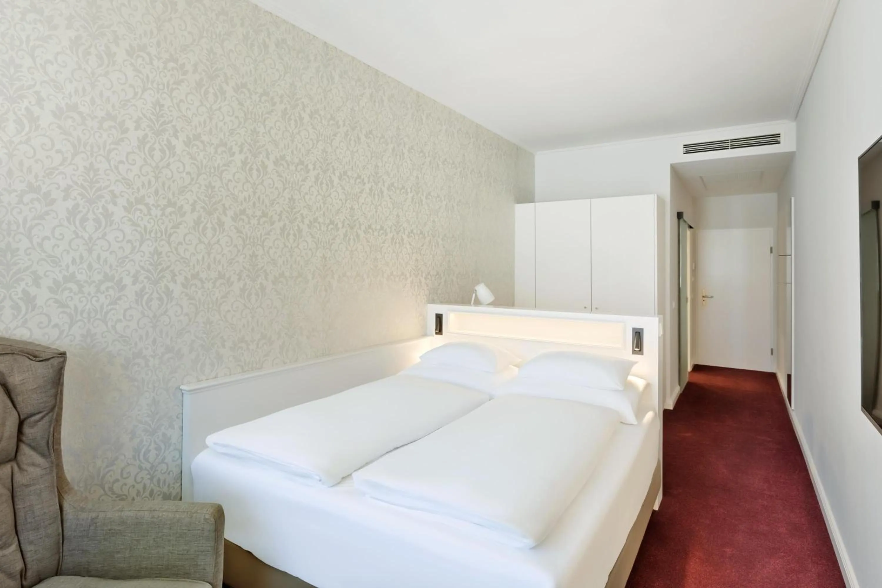Bed in Hotel Rathauspark Wien, a member of Radisson Individuals