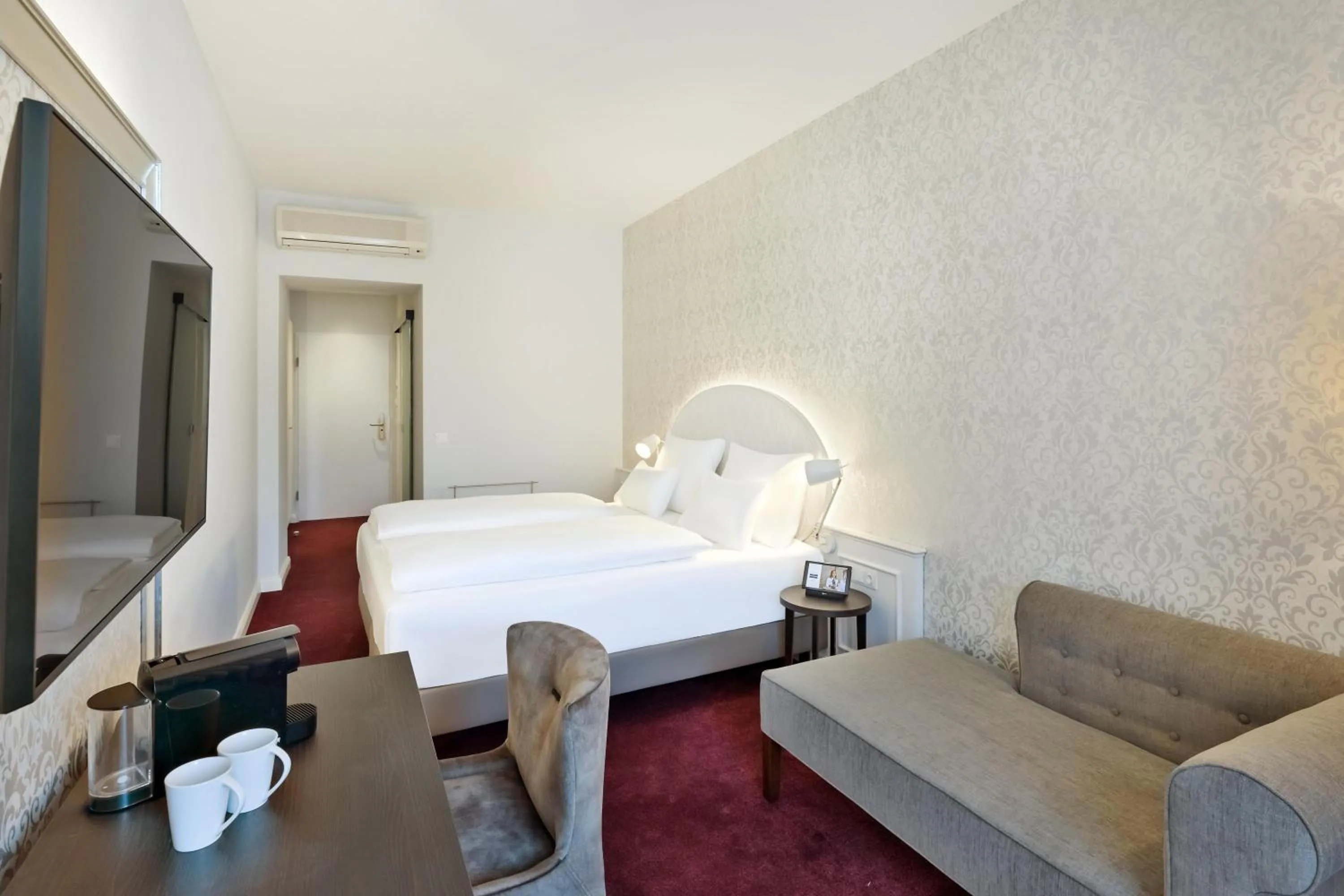 Bed in Hotel Rathauspark Wien, a member of Radisson Individuals