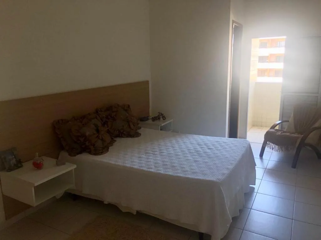 Bed in Apartamento área nobre da praia grande, vista para o mar, 3 suítes