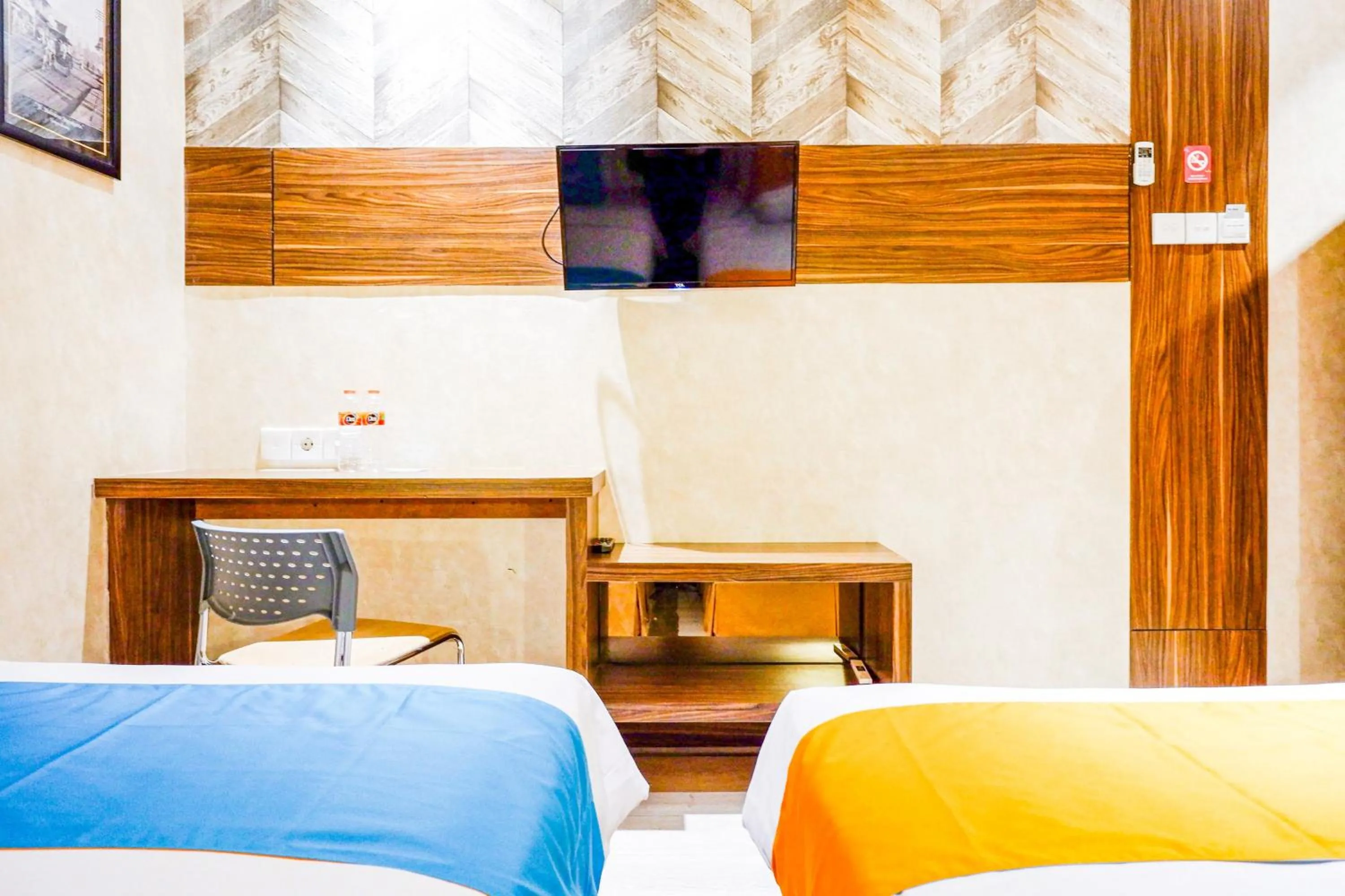 Bedroom in Sans Hotel Ekkon Yogyakarta by Reddoorz