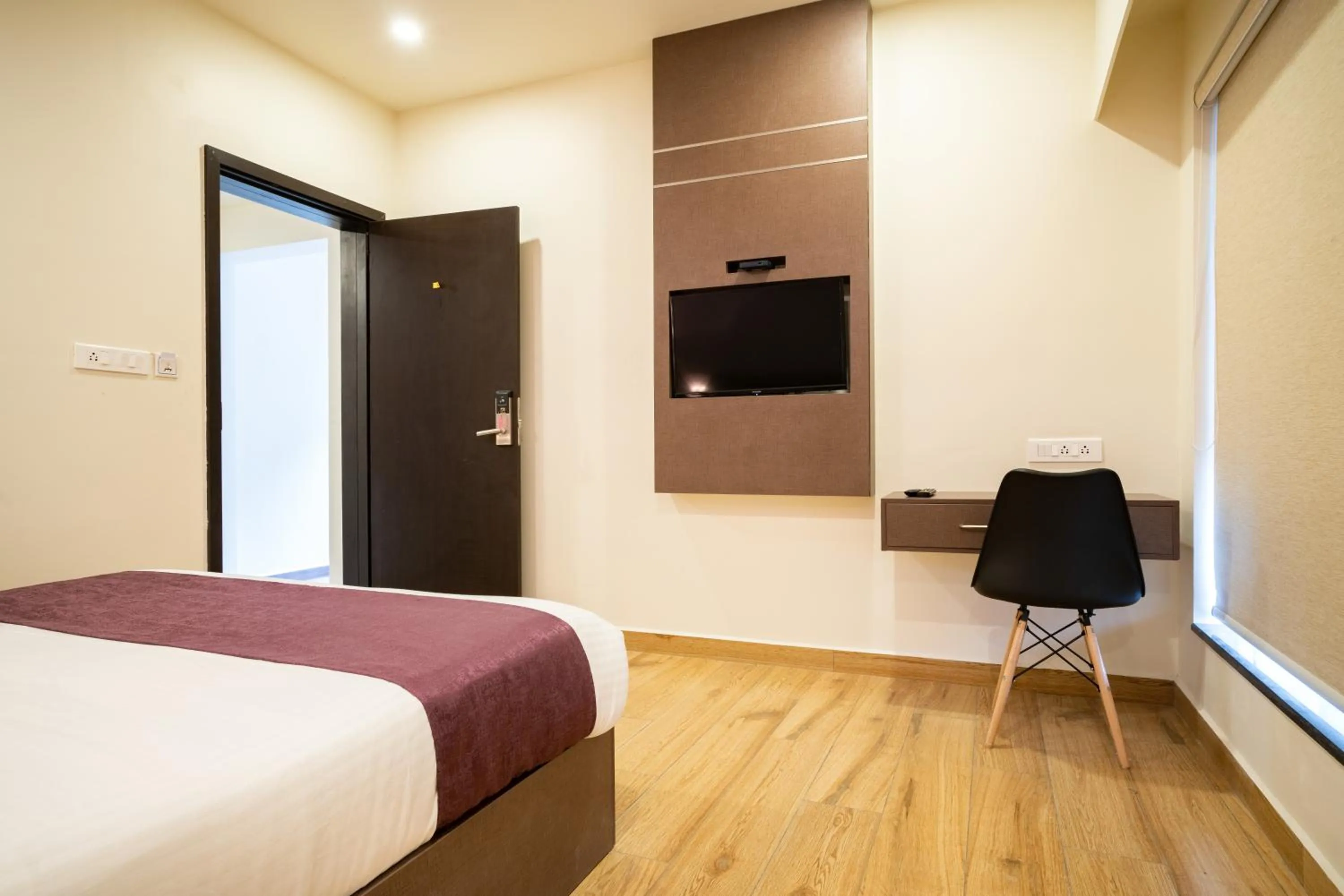 Communal lounge/ TV room, Bed in Lavender Infopark Kochi